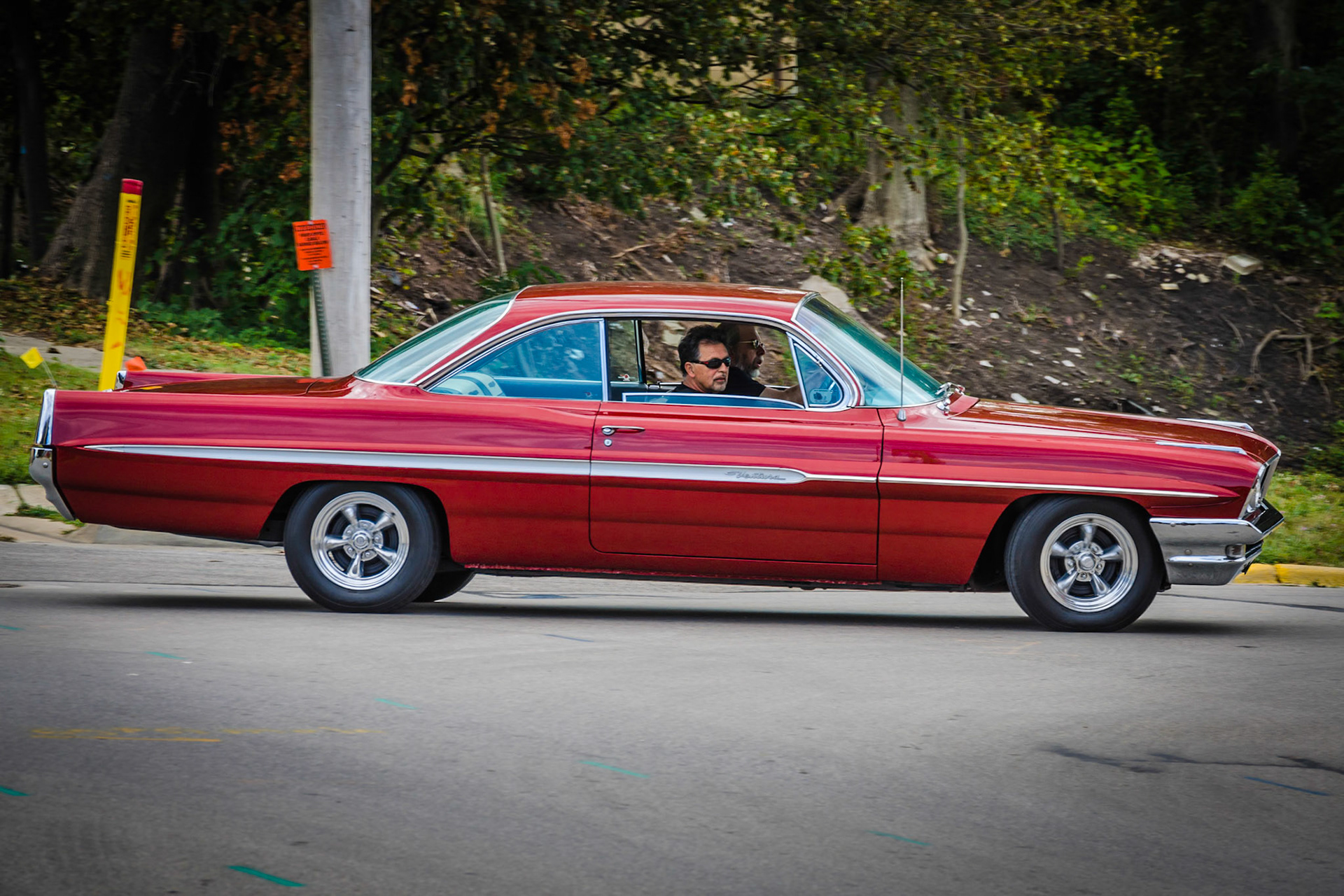We were just leaving a car and boat shown in Manistee, Michigan when this sweet thing drove by.