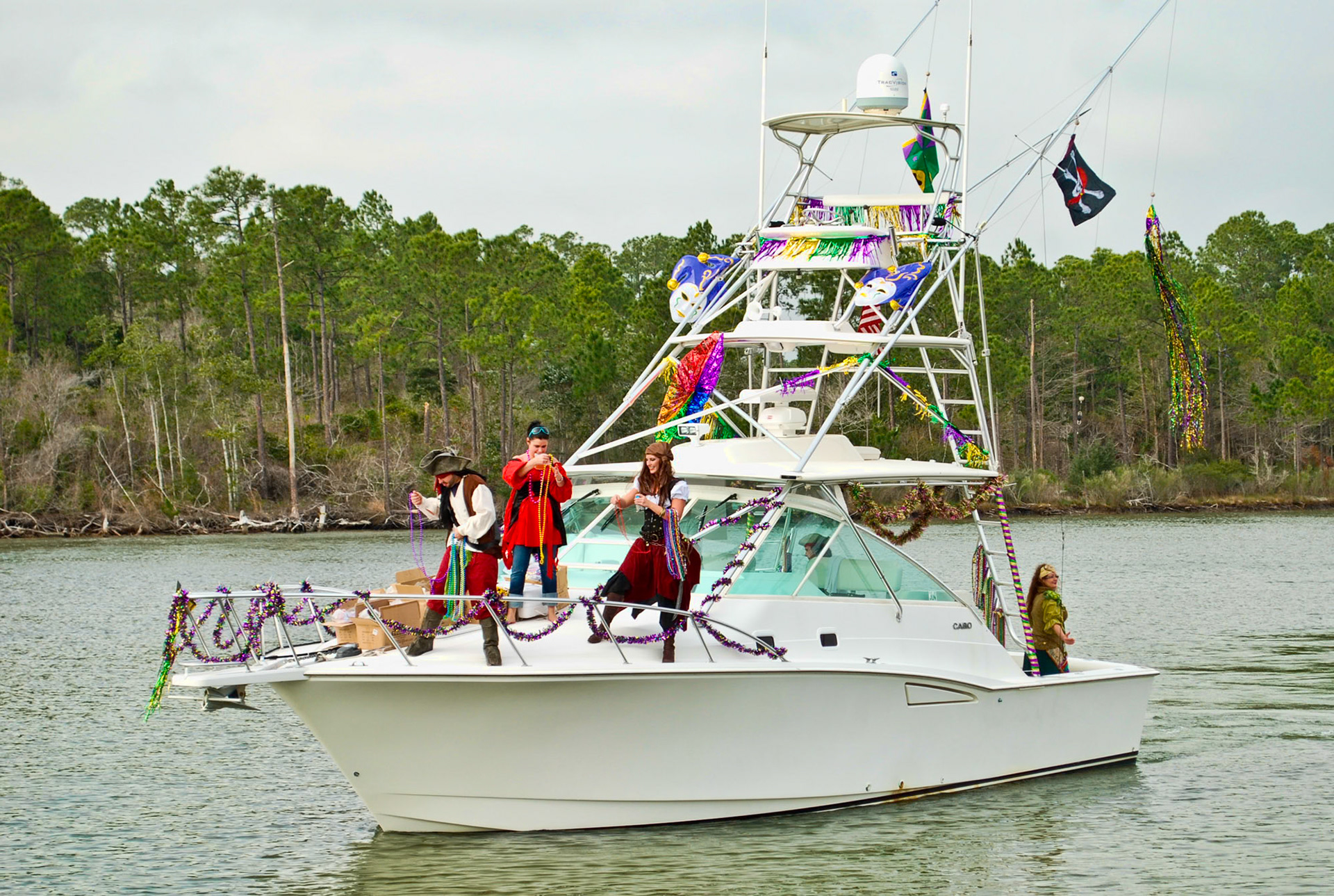 Pirates throughing beads. At the Mardis Gras boat parade on the intercoastal waterway.