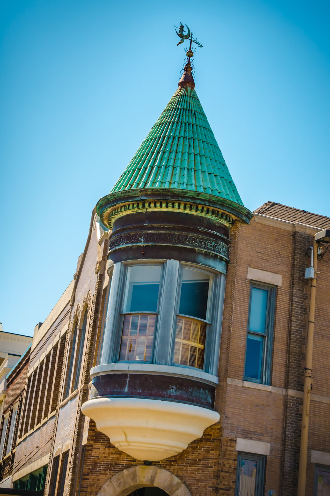 At the corner of Lemeuse &amp; Howard street. It's part of the Vieux Marche area in the historic downtown area of Biloxi, Mississippi.  Victorian c. 1896 that was the orginal Peoples Bank Building.