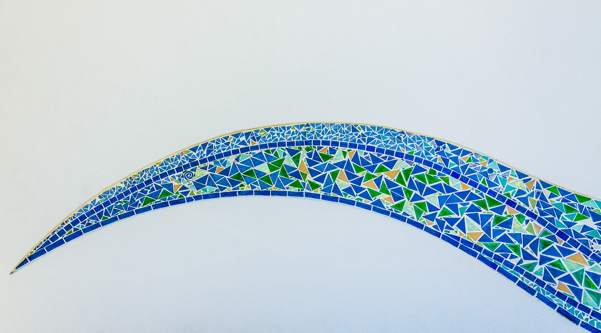 Close up of mosaic tile wave symbolizing the storm surge brought by Hurricane Katrina.  At the Hurricane Katrina Memorial in Biloxi, Mississippi.