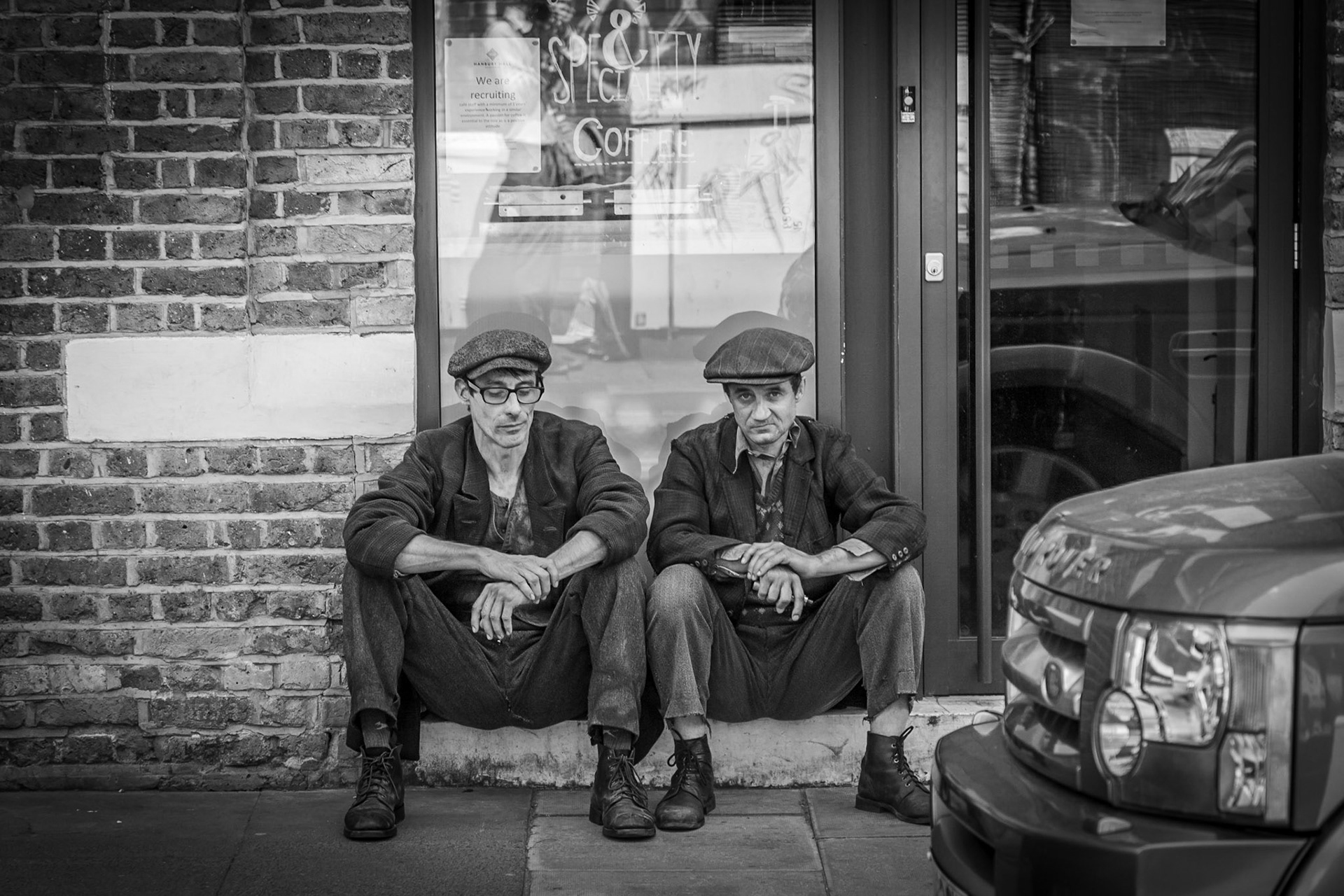 I seem to keep stumbling across movie sets whilst walking the streets of London, and I happened across these two taking a break just round the corner from the set.