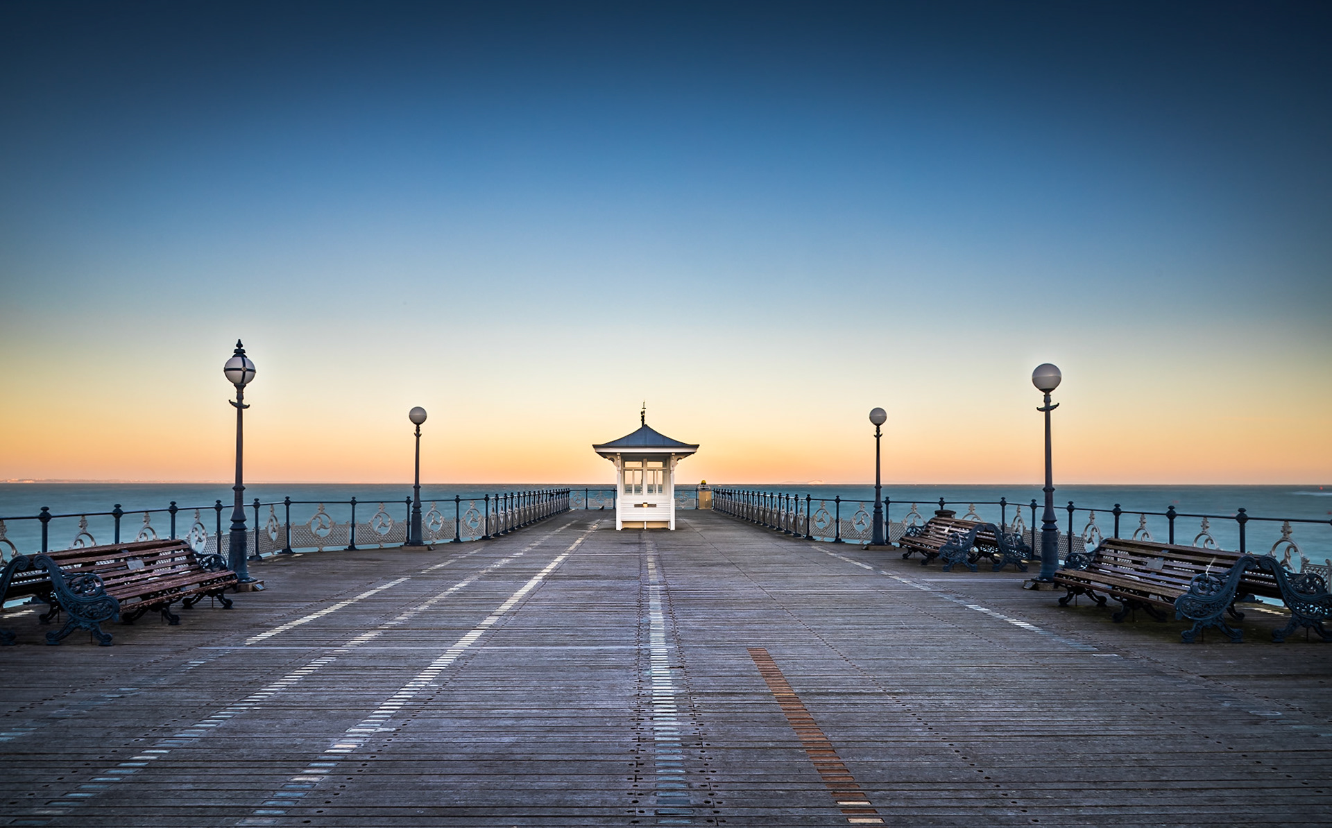 A featureless sky over the new(er) pier at Swanage.  My favourite kind of shot with a central element with lines of perspective and symmetry.