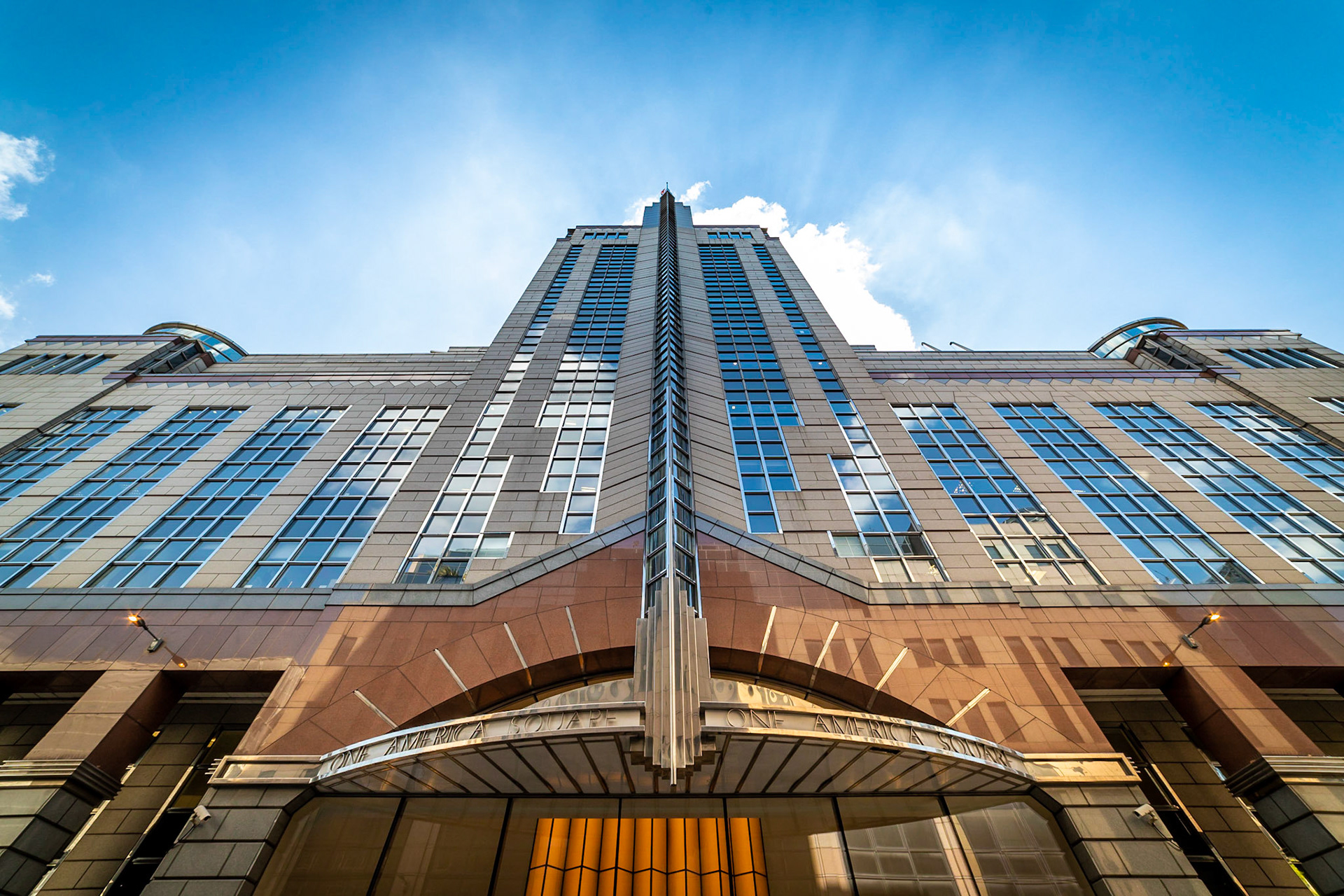 This building is just around the corner from my office and I've been eyeing up the art deco exterior for a while but never found the right framing.  Well I just received a 14mm lens and this seemed like a good candidate