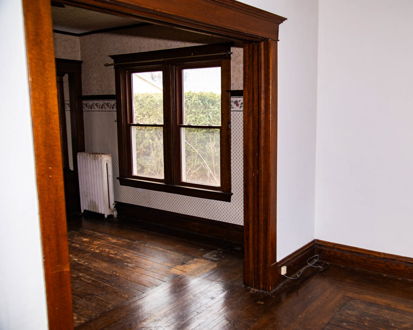 Living Room - Looking to South West into Dinning Room... Note Pocket Doors Between