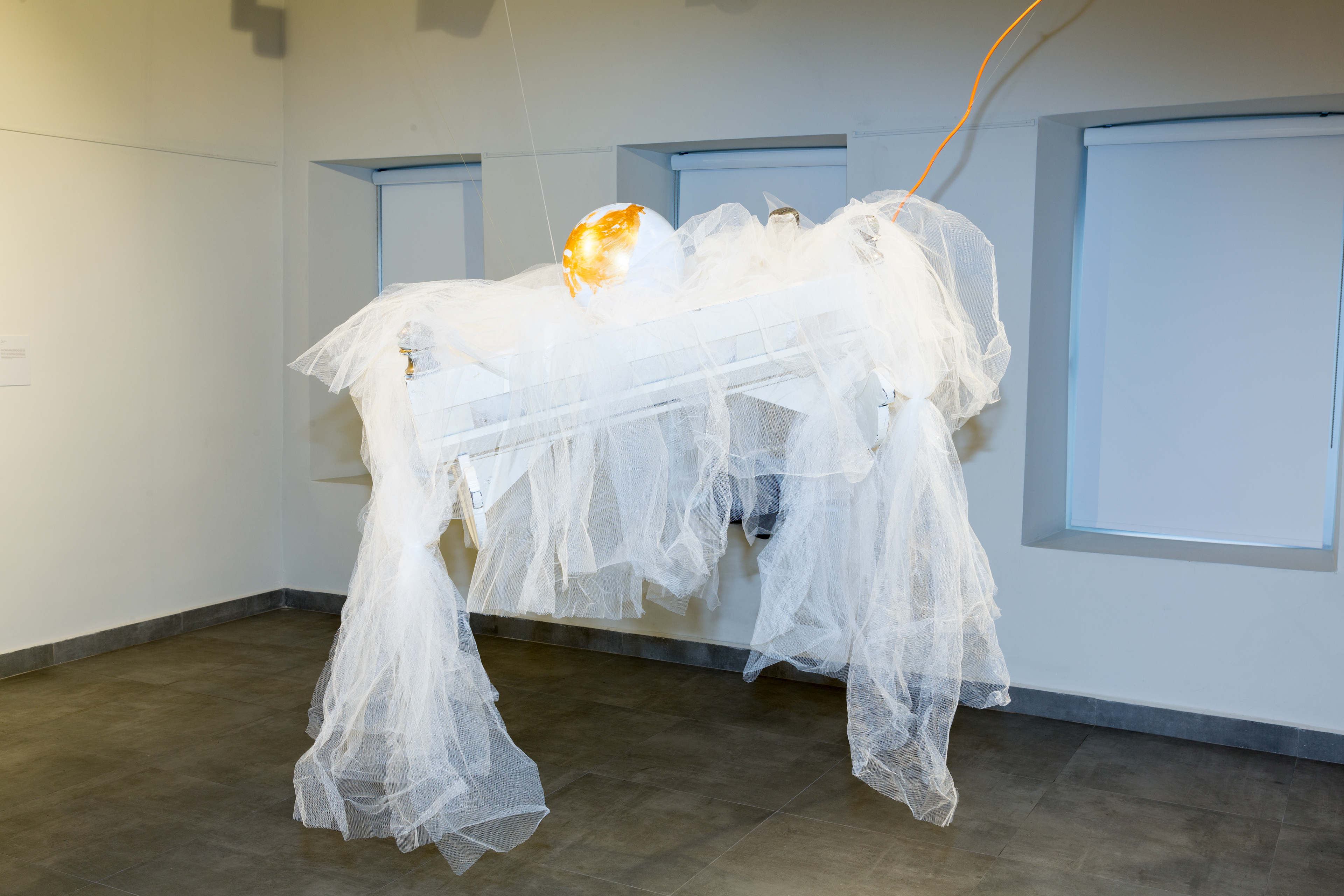  Urfalı Cradle, 2017, Changeable Size, tulles, cable, globe, handmade unique to Şanlıurfa Besik, Independent Art Foundation Art Gallery, Istanbul. Photo: İsmail Coşkun.