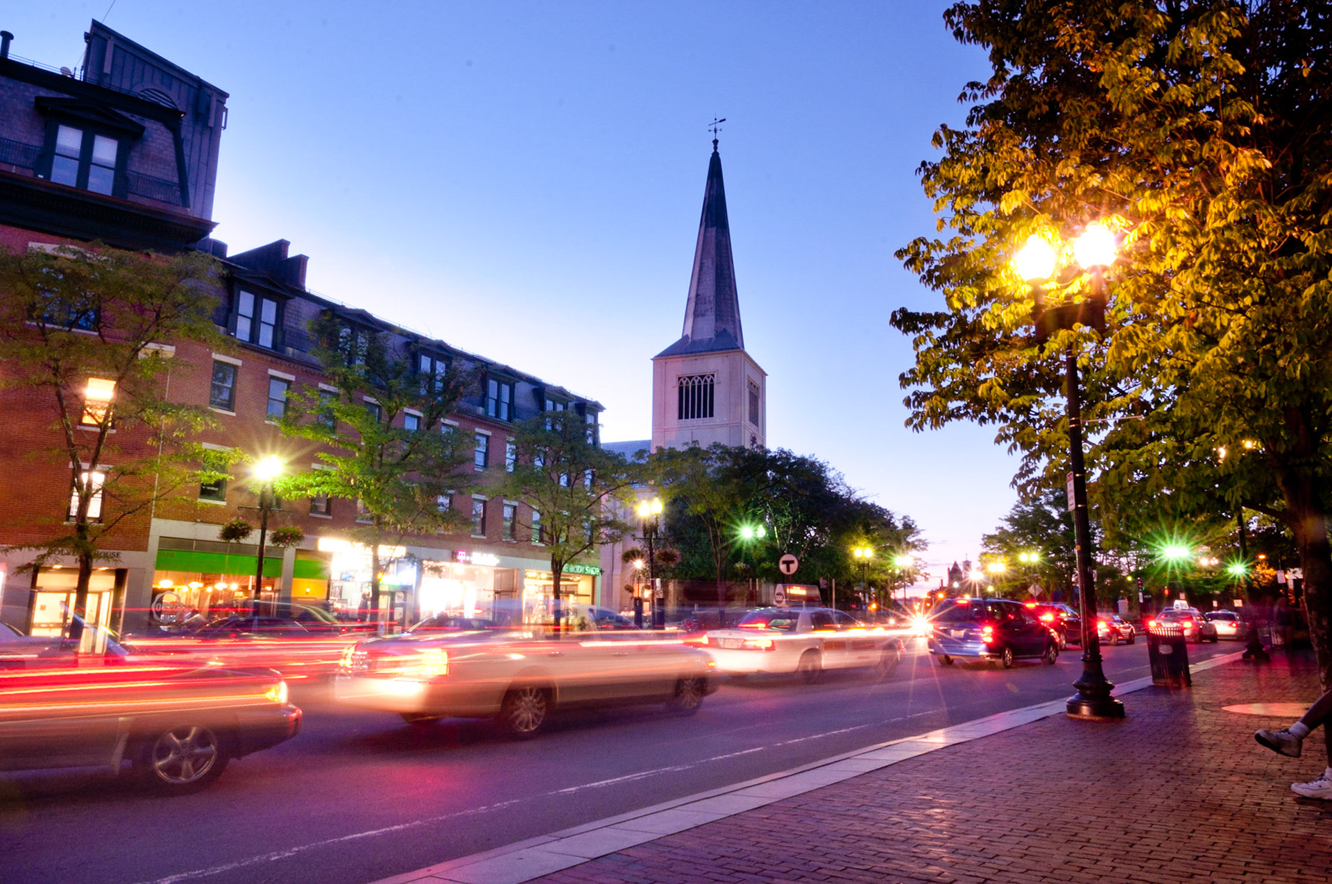 Twilight along Massachusetts Avenue, which runs adjacent to Harvard Yard and Harvard Square.
