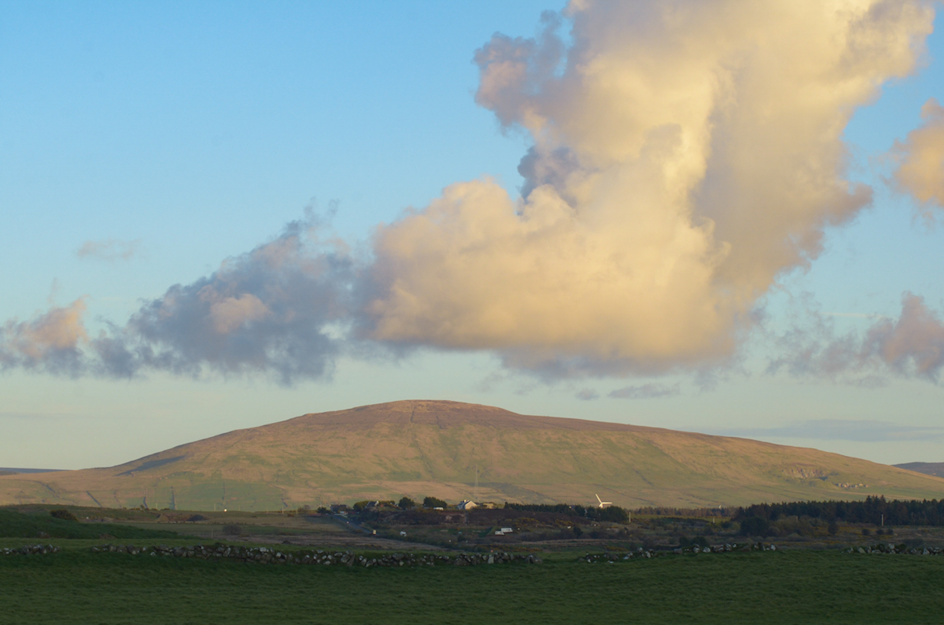 Knocklayd Mountain: A distinctive cone-shaped peak rising from the Antrim plateau, 514 metres high, with moorland approaches and expansive views across North Antrim and the Mull of Kintyre.