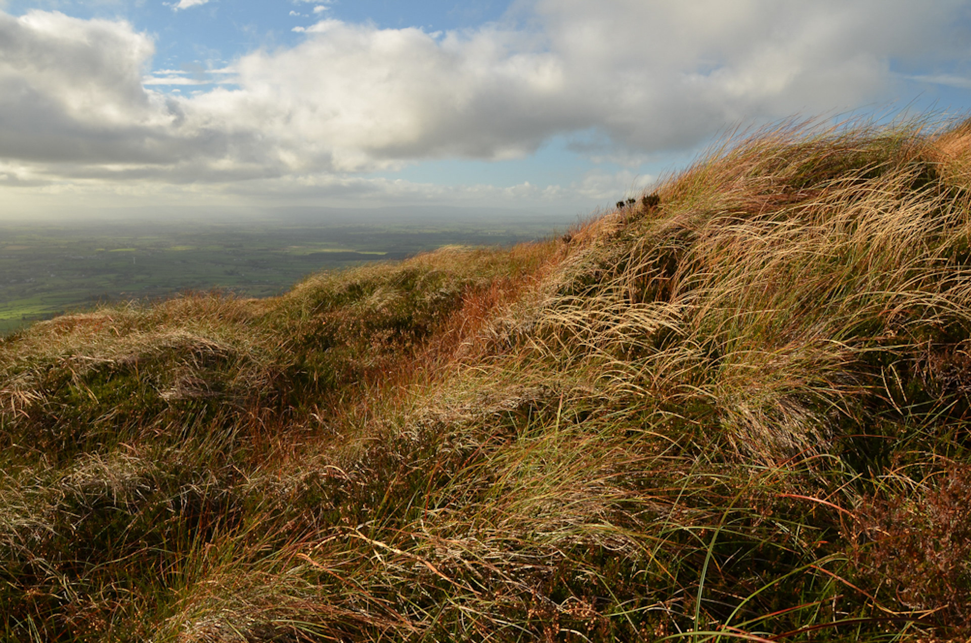 Knocklayd Mountain: A distinctive cone-shaped peak rising from the Antrim plateau, 514 metres high, with moorland approaches and expansive views across North Antrim and the Mull of Kintyre.