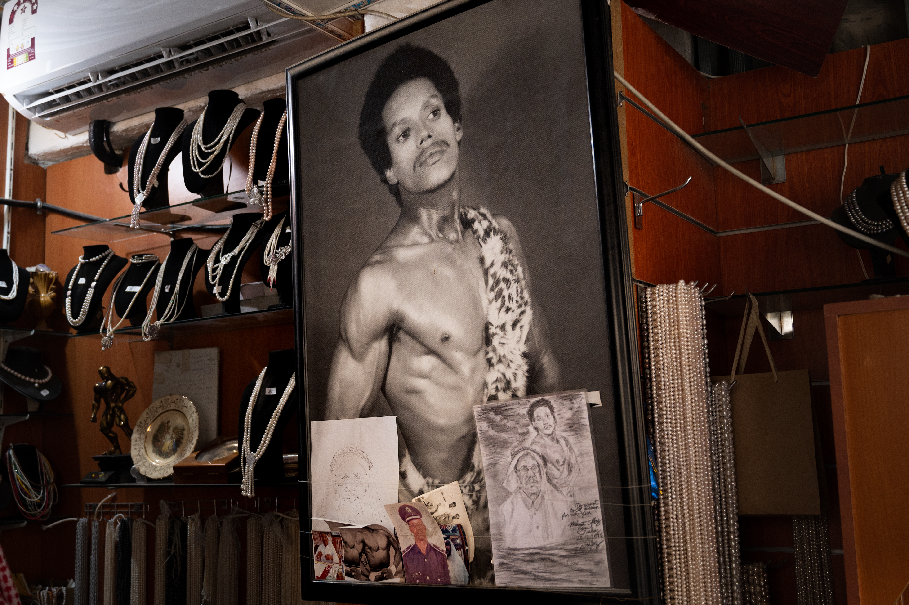 Al-Jassem was once a weightlifter. His shop bears the name 'Pahlwan', translating to 'strongman' or 'wrestler'.