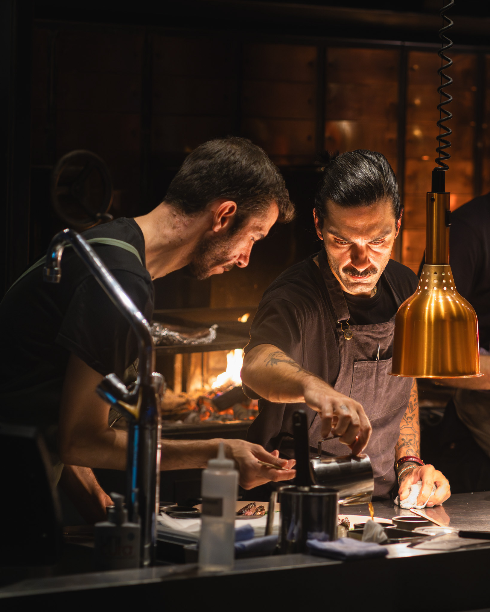 Chefs cooking with fire