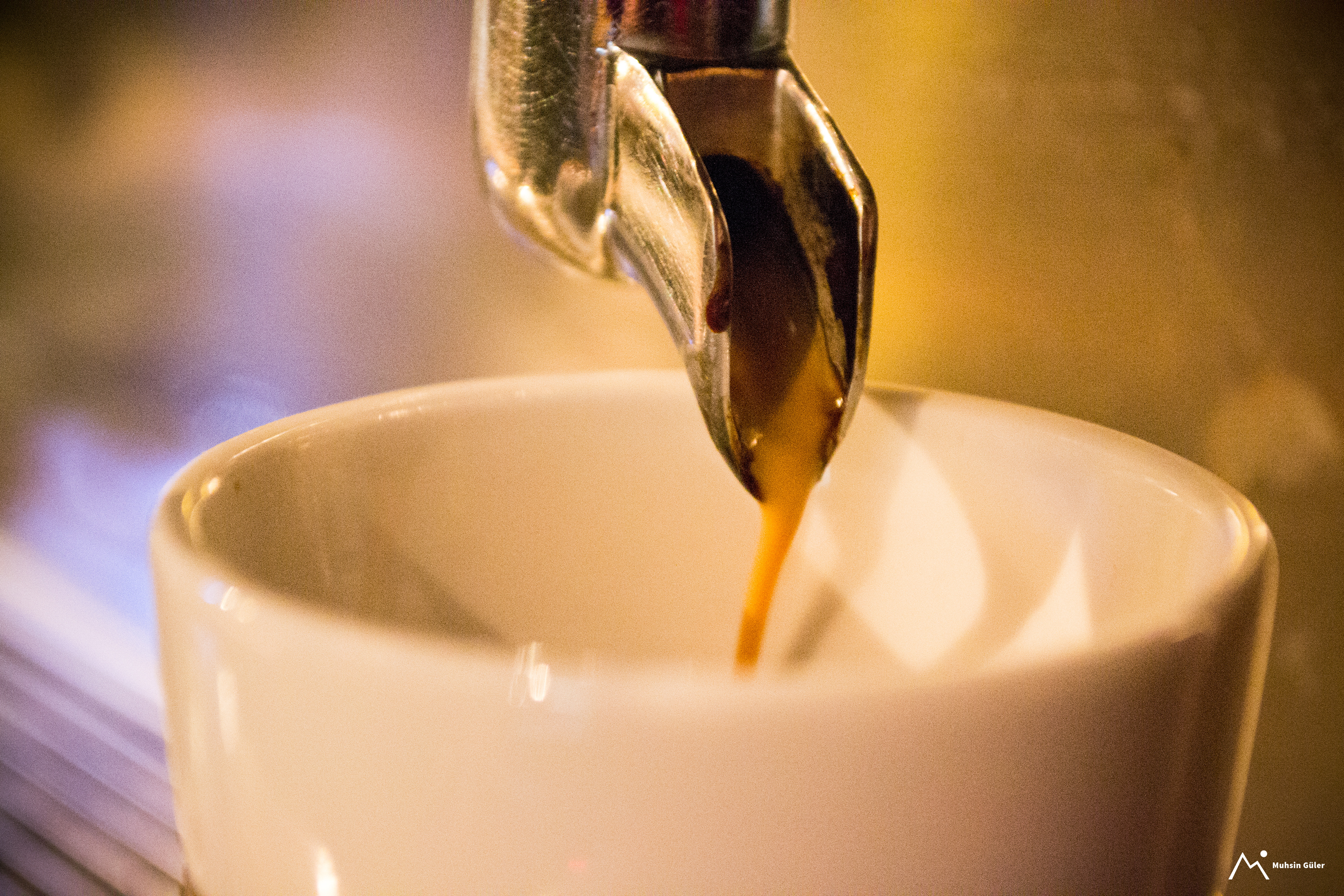 Slow Pour of Freshly Brewed Espresso from Cafe Machine