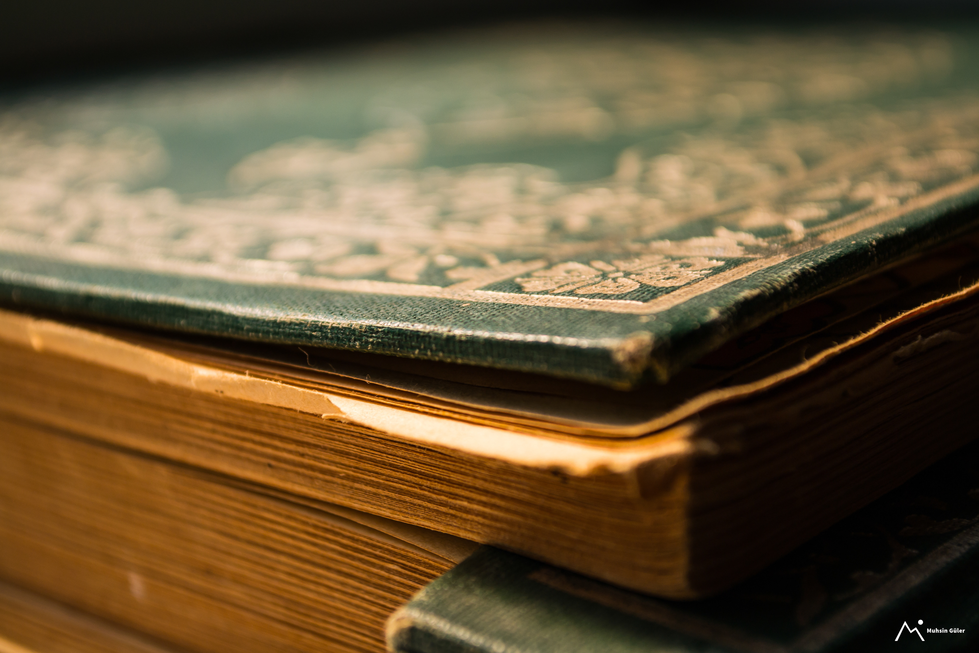 The Illuminated Quran: A Treasured Relic Glowing in a Mosque's Radiance
