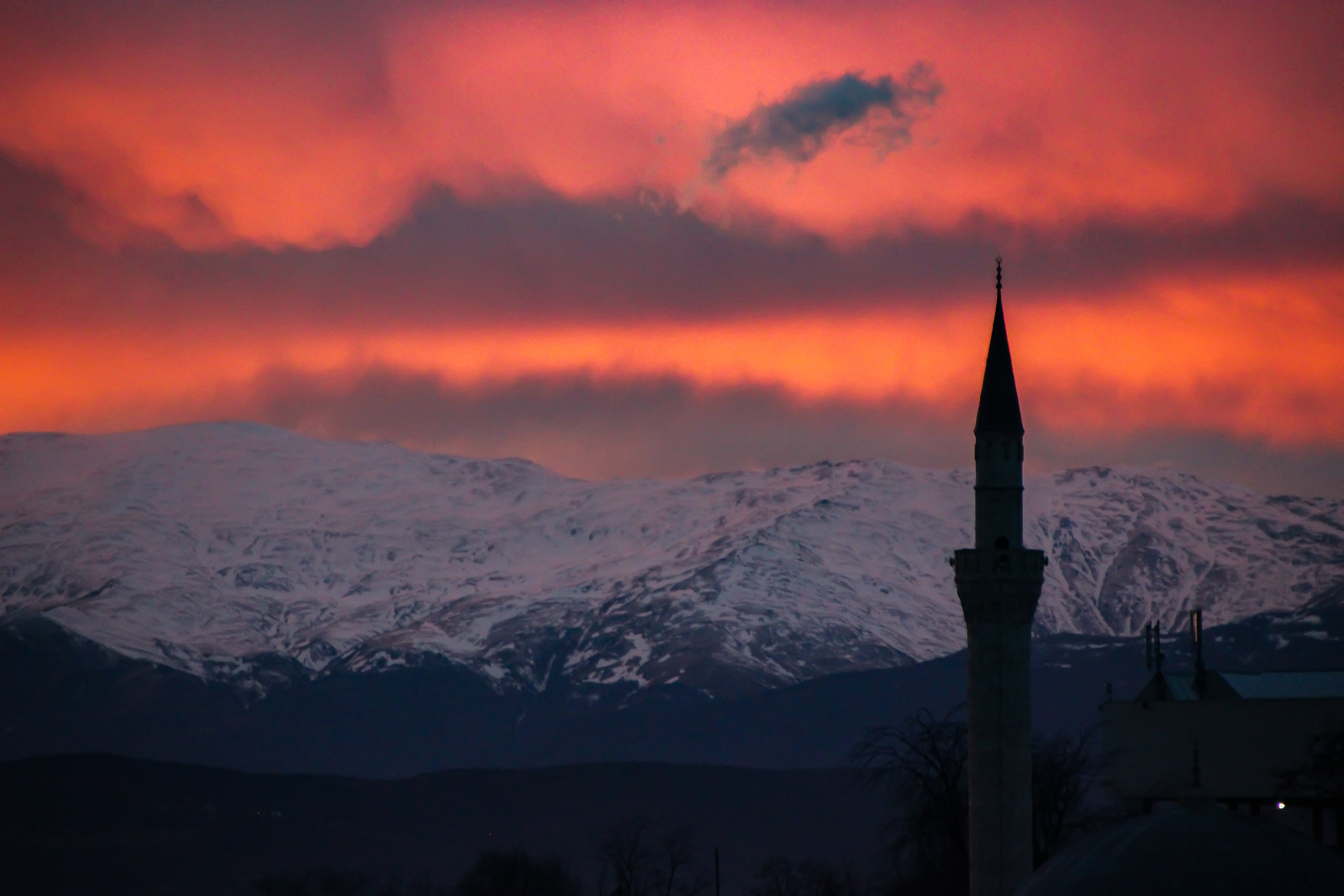 Orange Clouds over Mustafa Pasha Mosque and Snowy Mountains in Skopje