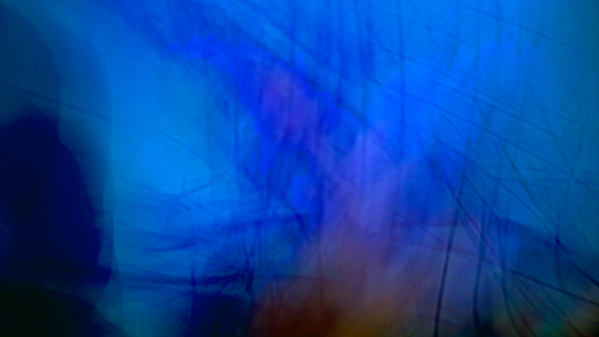   one in a series of three paintings depicting an abstract landscape in many shades of blue with hints of green orange and pink giving the viewer a sense of  being underwater