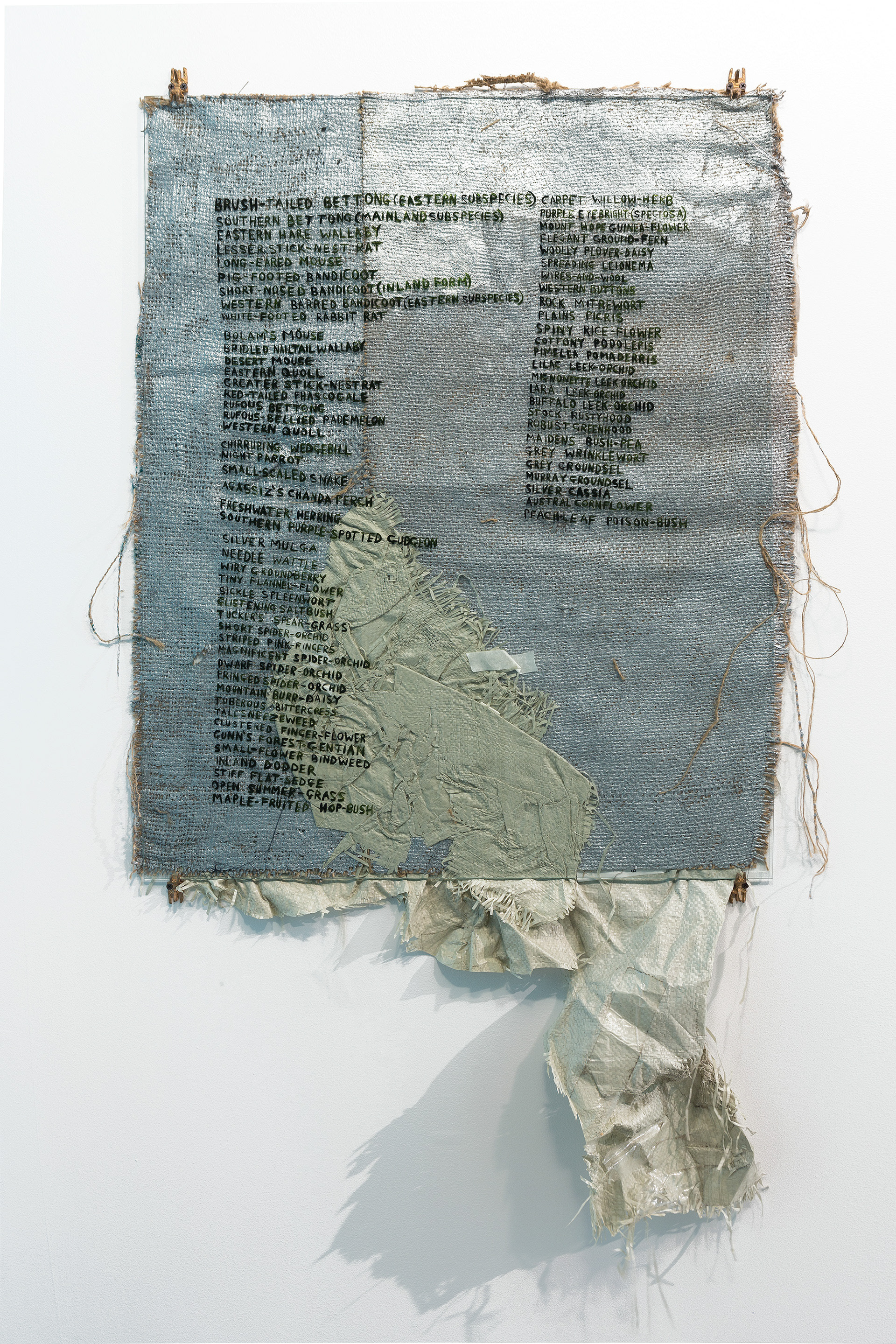 War Memorial (VIC); 2014; UTS Gallery; oil on toughened glass, acrylic on hessian, plastic packaging and tape, bronze; photography by Jessica Maurer