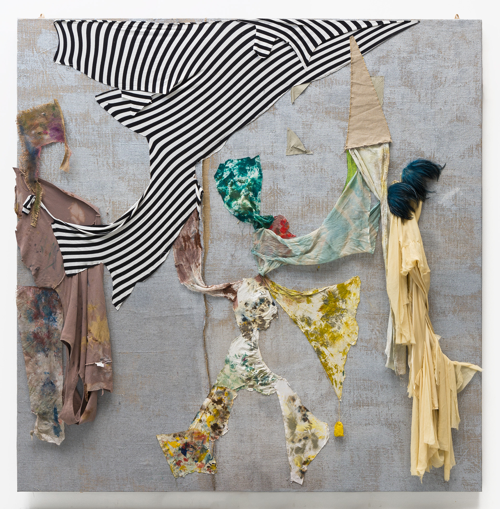 «I am a flood: across a plain; I am a thorn: beneath the nail» 2019, recycled textiles, paint rags, wood, acrylic, wax, oil, Grandmothers feathers. 205 x 208 x 7 cm.