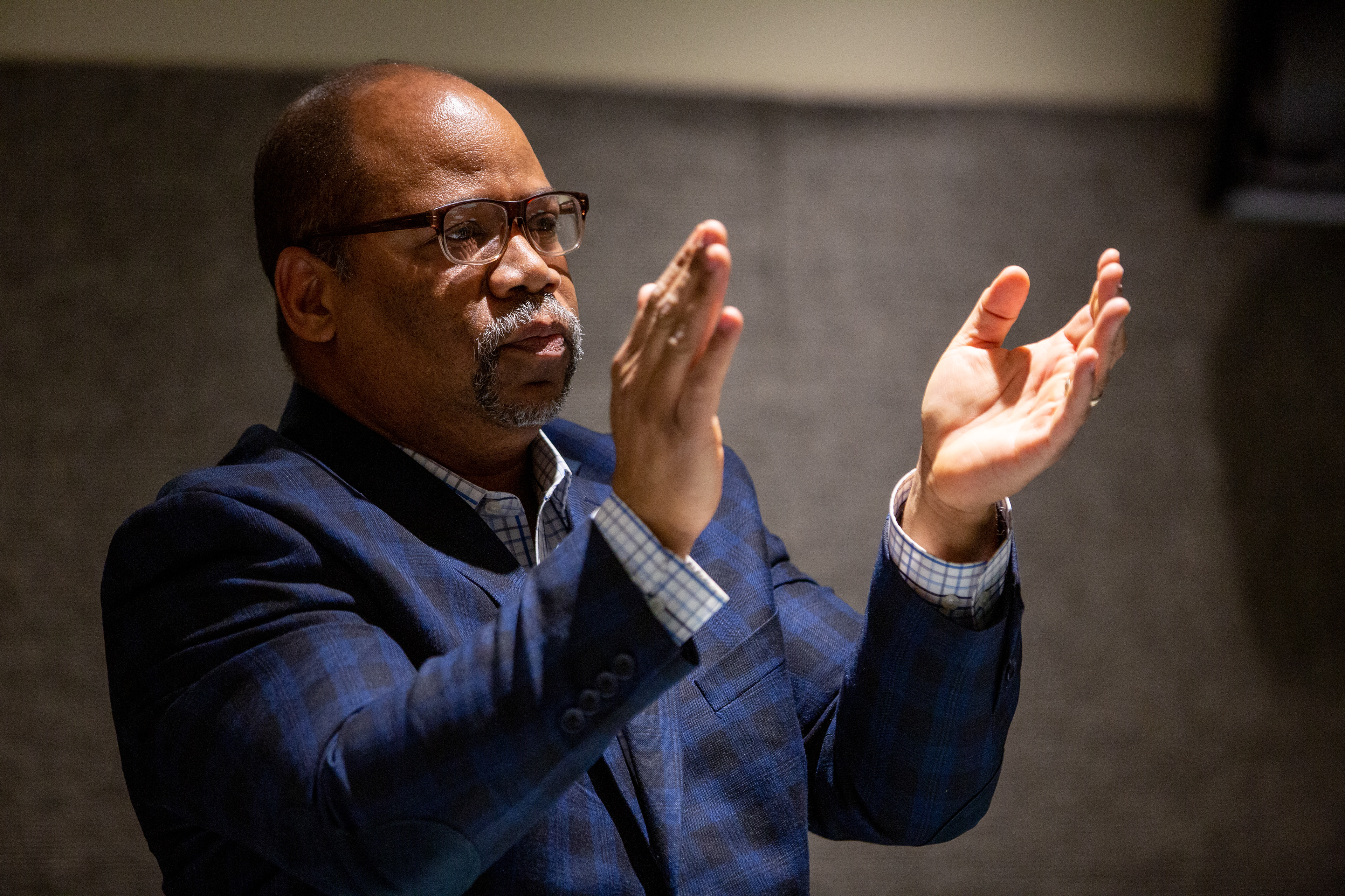 Van White, president of the Rochester Board of Education, claps after a student gives a speech at a school board meeting on why teachers are so important to schools and why their positions shouldn’t be cut. December 5, 2019 in Rochester N.Y.