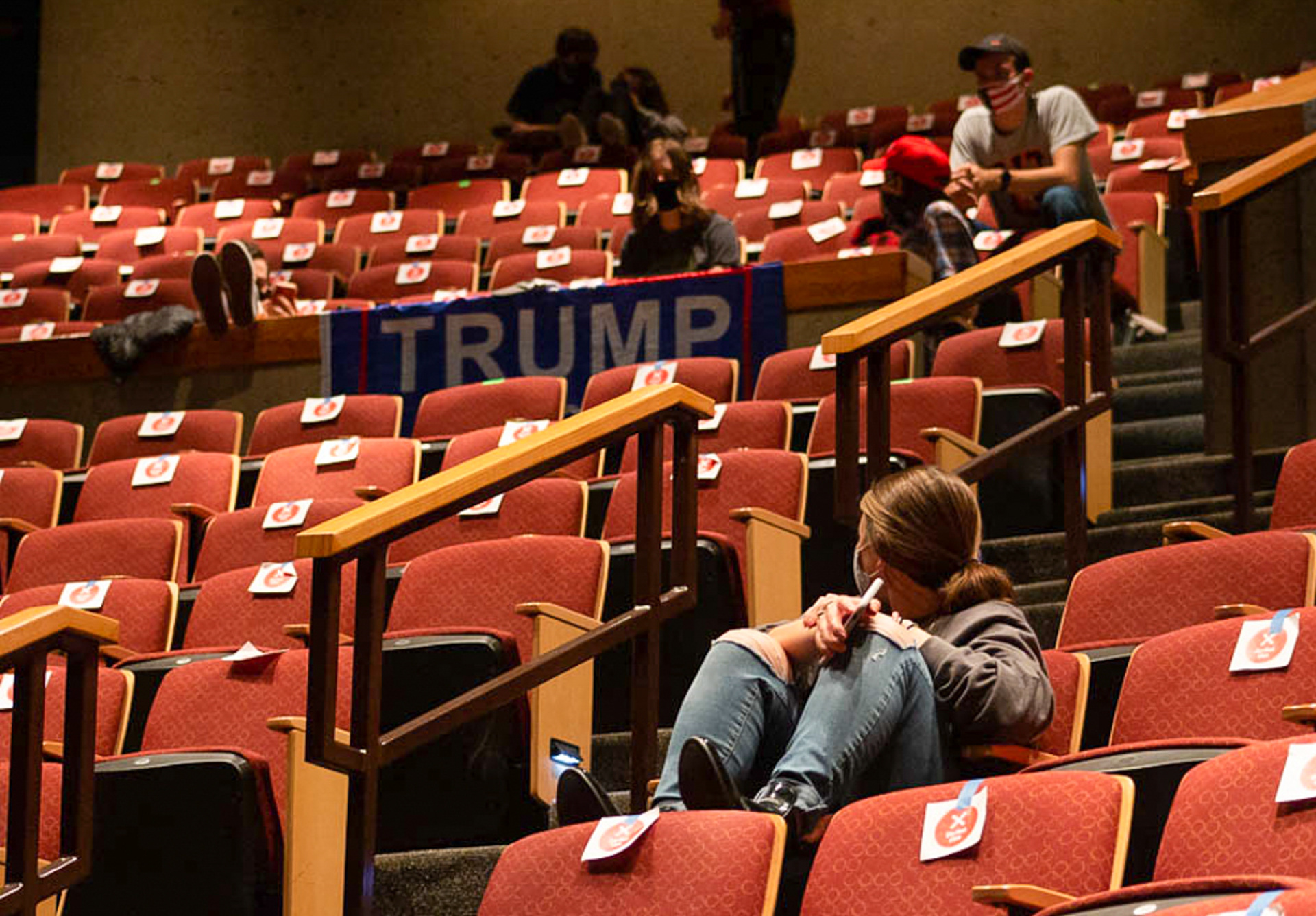 Jennifer Motsko looks back at the Trump supporters in the crowd at the R.I.T. Ingle Auditorium live presidential debate-viewing on September 29, 2020 in Rochester N.Y. Motsko exclaims as she walks into the room “Oh my God, Trump supporters.” She also suggests to her friend to “Put your mask back on…you’re gonna look like a Trump supporter.”