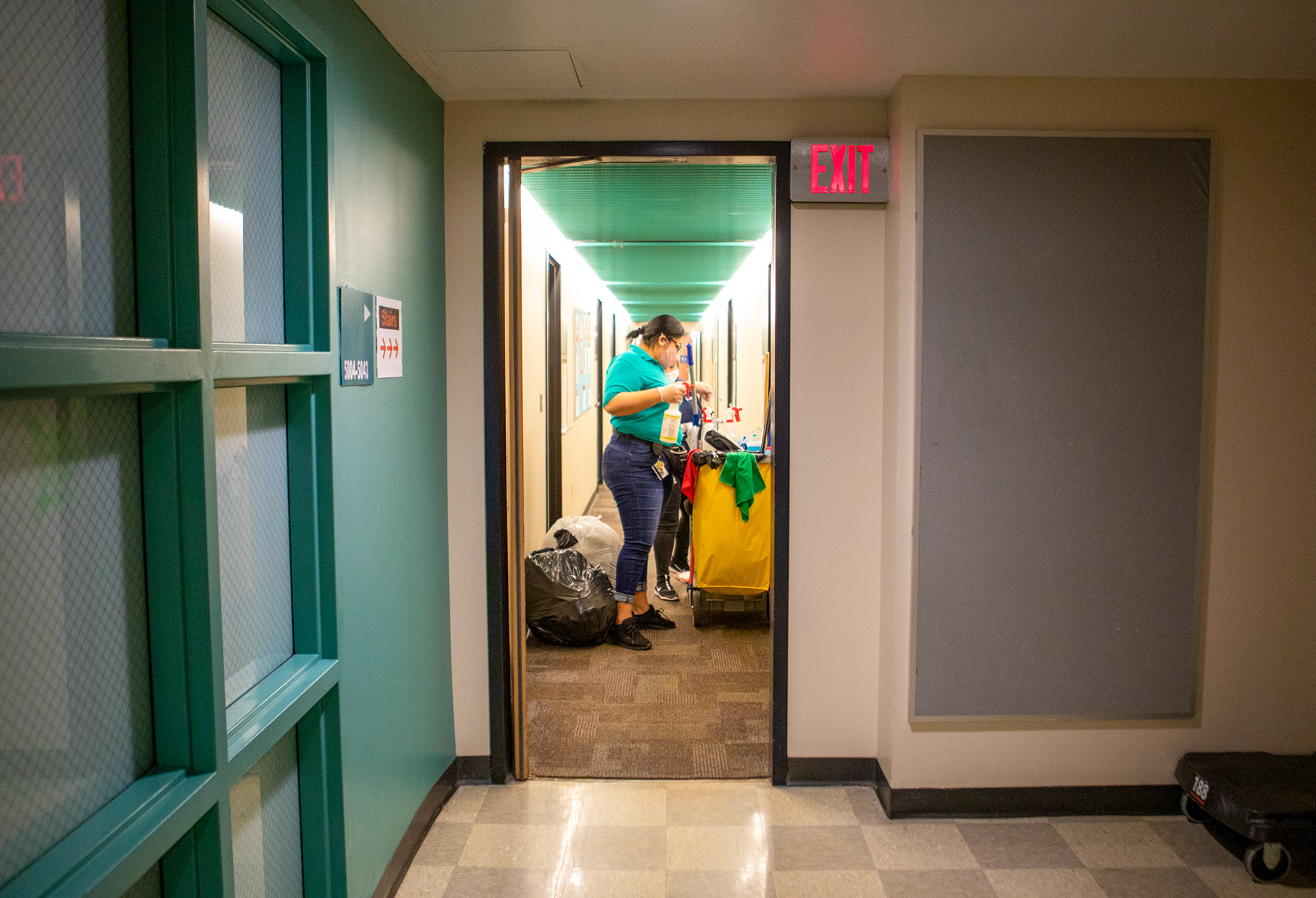 Keyla Sanchez and Siam Berrios work on a Saturday for overtime pay in Colby Hall on November 14, 2020. Sanchez says "RIT allows us to work Saturdays and Sundays if we want for overtime. We work either here in dorms or at the gym and pool."