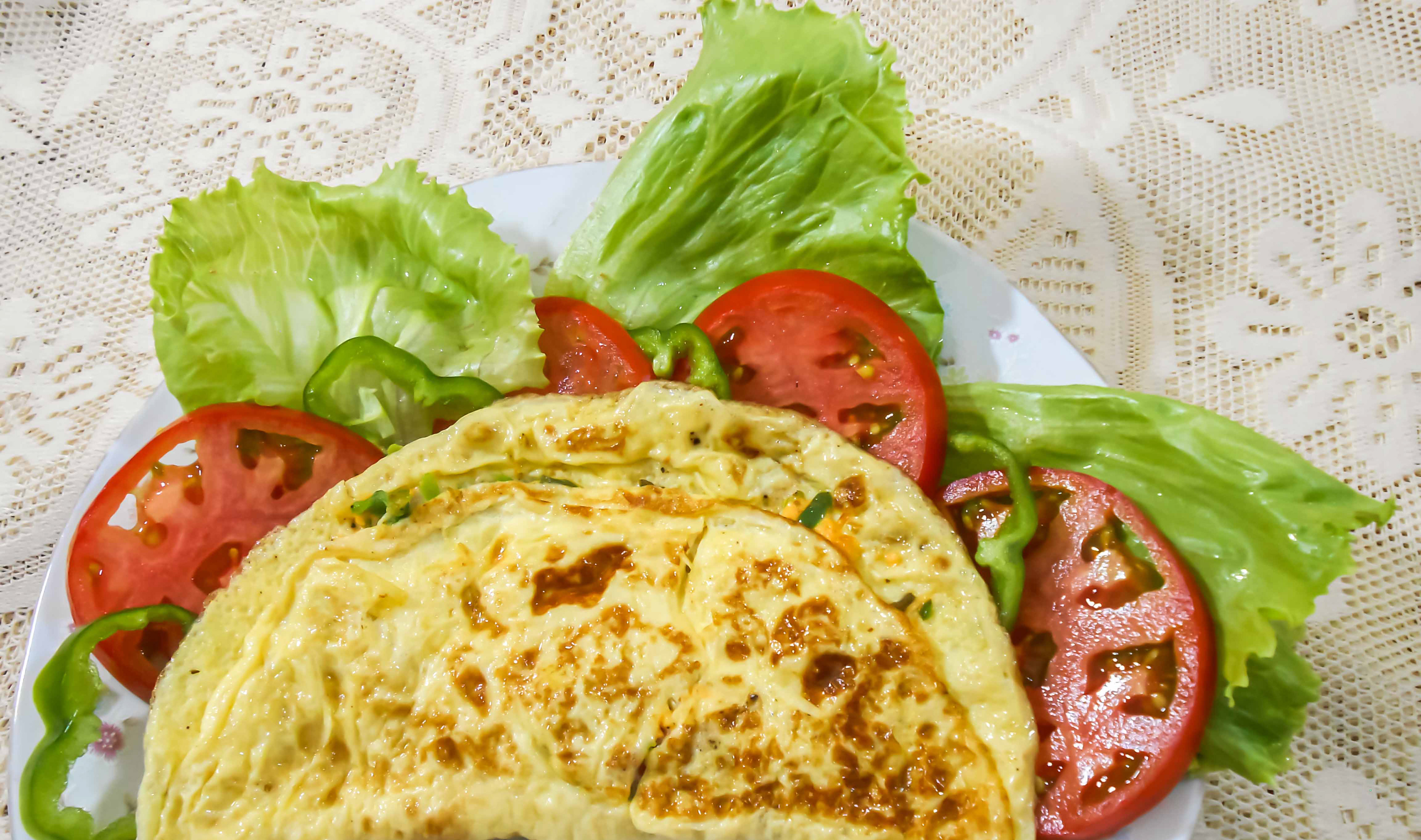 Cheese omelette and vegetables in plate. Link to blog.