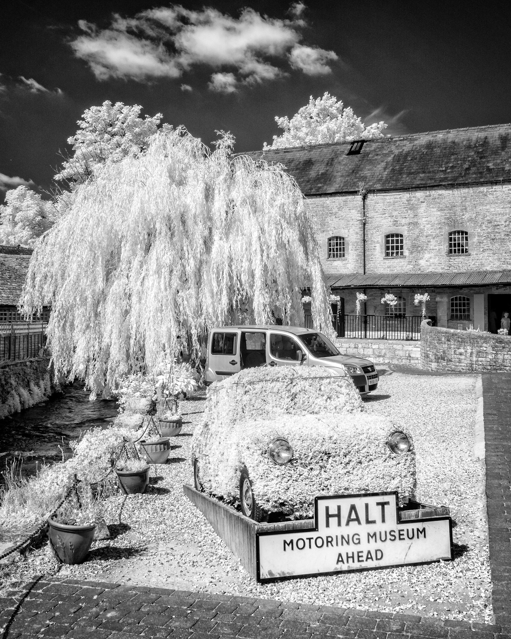 Automotive topiary is in Bourton-on-the-Water in the Cotswolds.