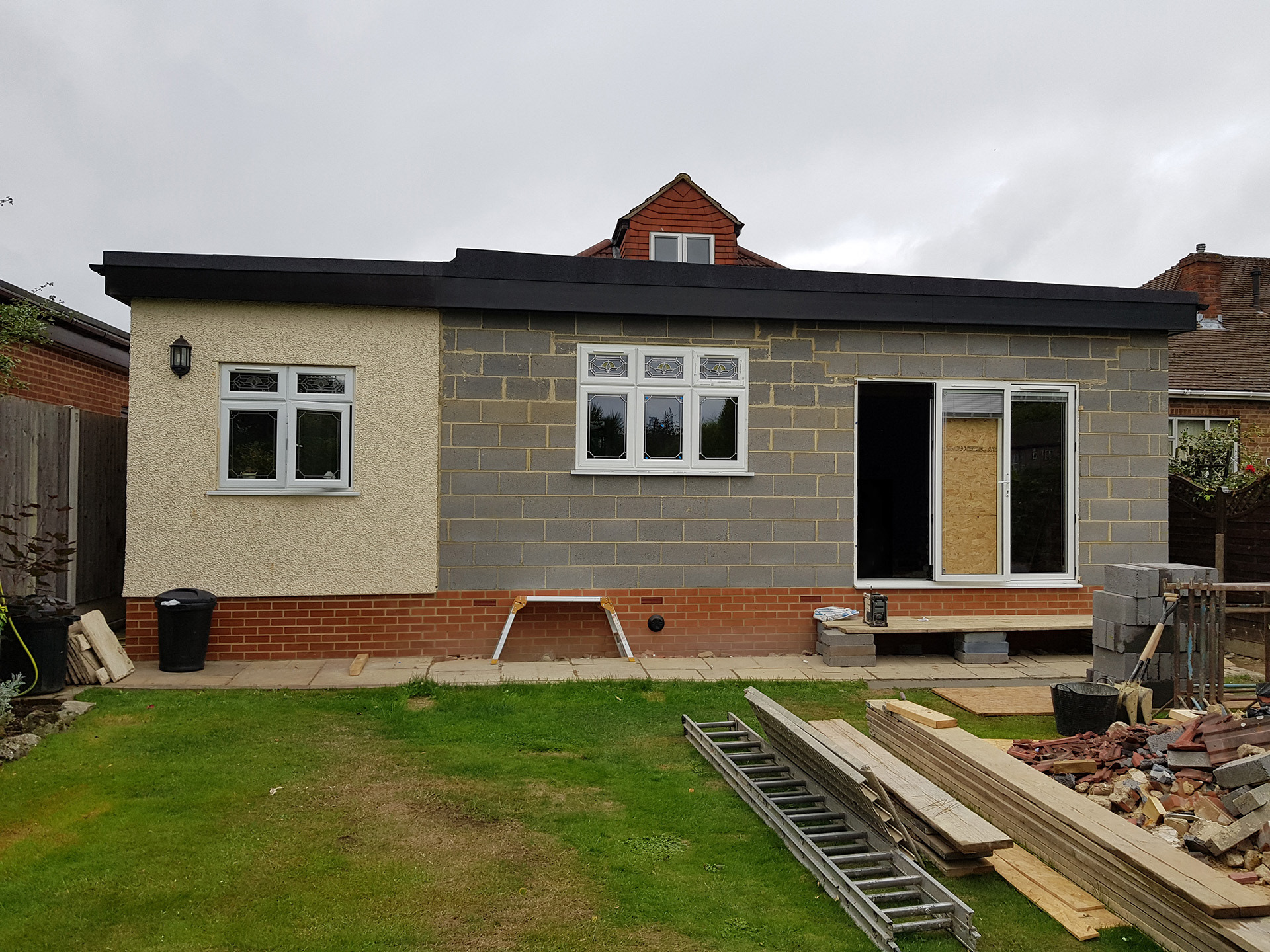 Windows and doors fitted on single storey extension.