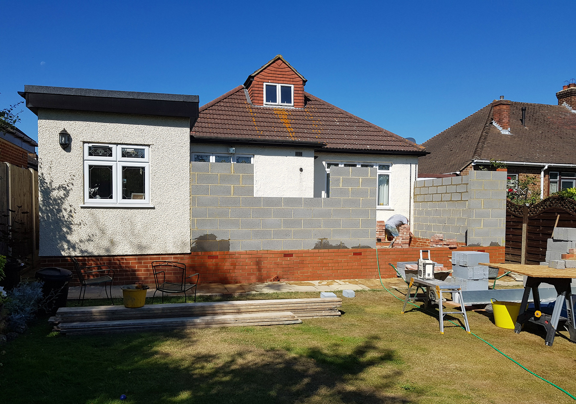 Brick work underway on single storey extension.