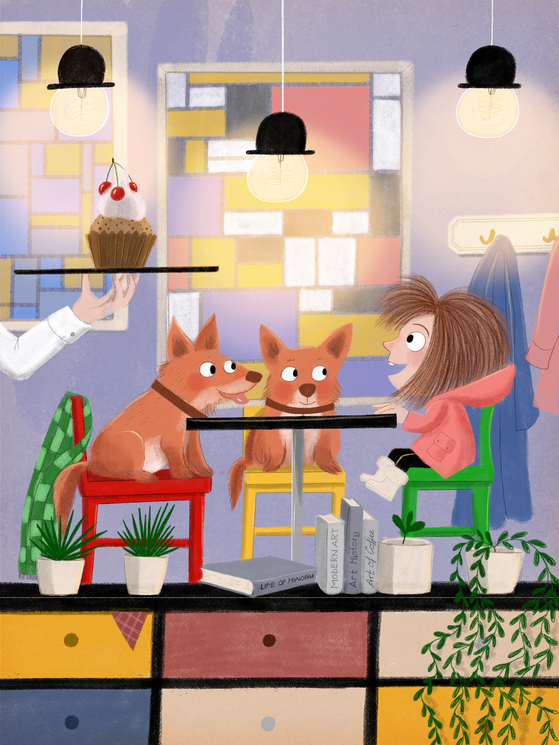 Mädchen sitzt mit zwei Corgies im Cafe
