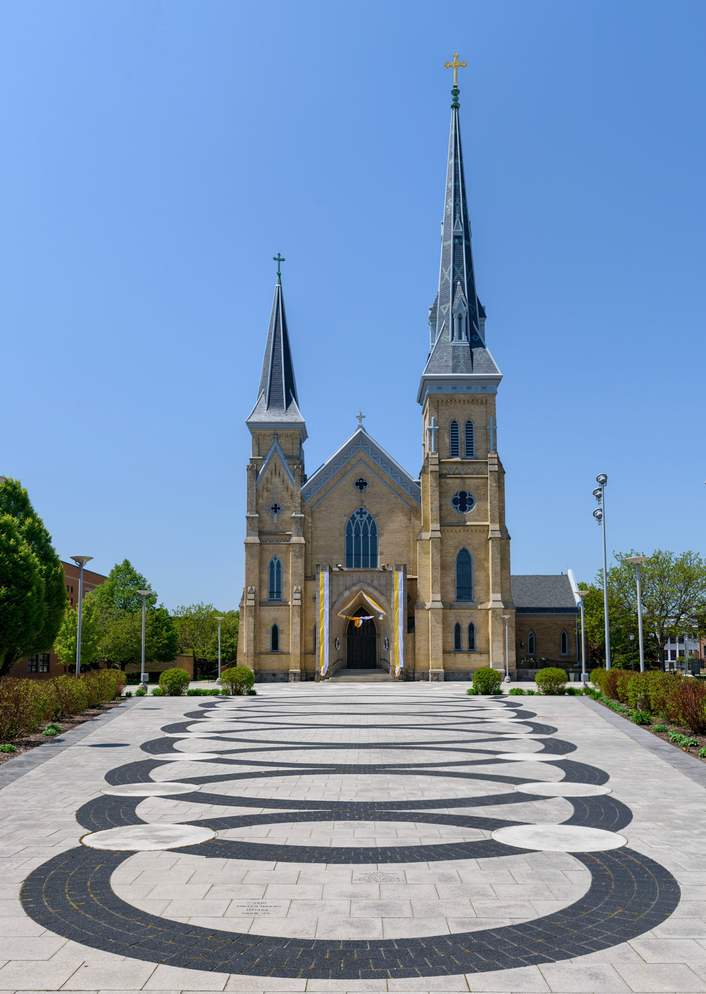 The Cathedral of St. Andrew in Grand Rapids, MI, decorated with yellow/white bunting in celebration of the election of Pope Leo XIV.