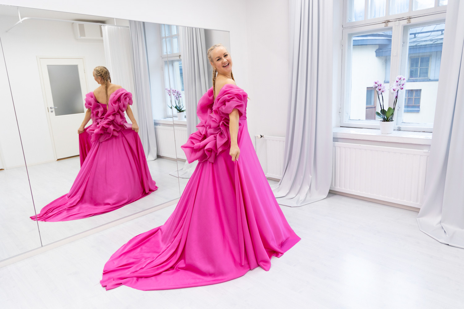 Cleaner, social media star Auri Kananen (Aurikatariina) tries on her dress prior to The Finnish Independence Day Reception. Iltalehti, 2024