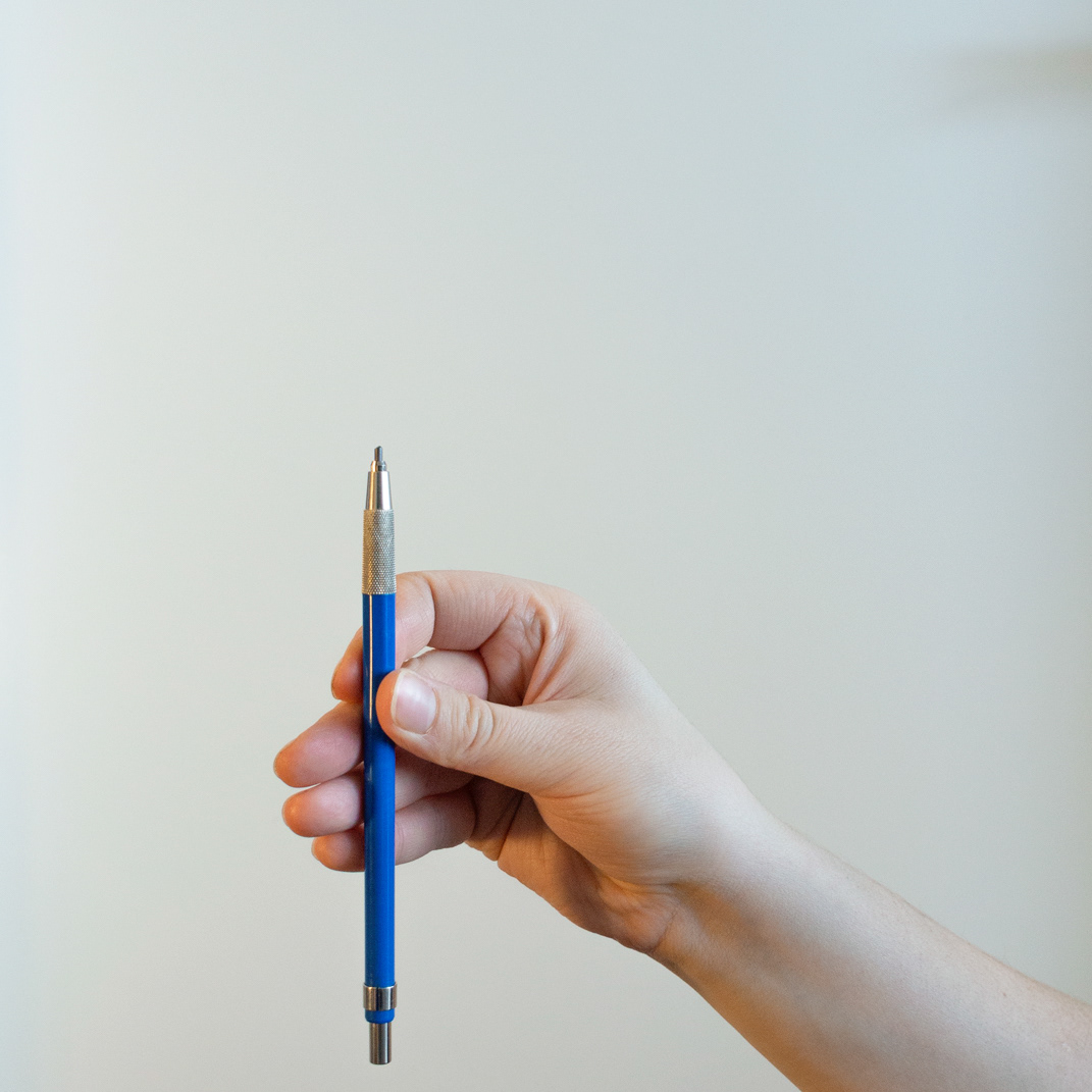 Lead holders can expose more graphite, which lets you angle the pencil and use the sides more easily.