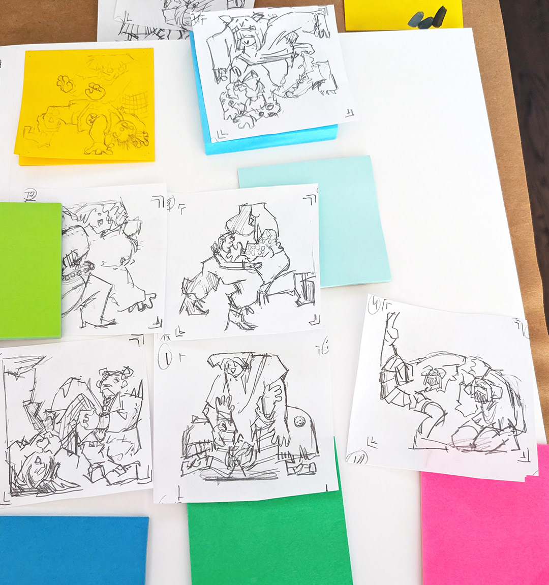 Sketches from the previous phase, with the japanese street fashion inspired cyberpunk clothing and character designs. Each sketch is set beside a sticky note colour, which will become its base.