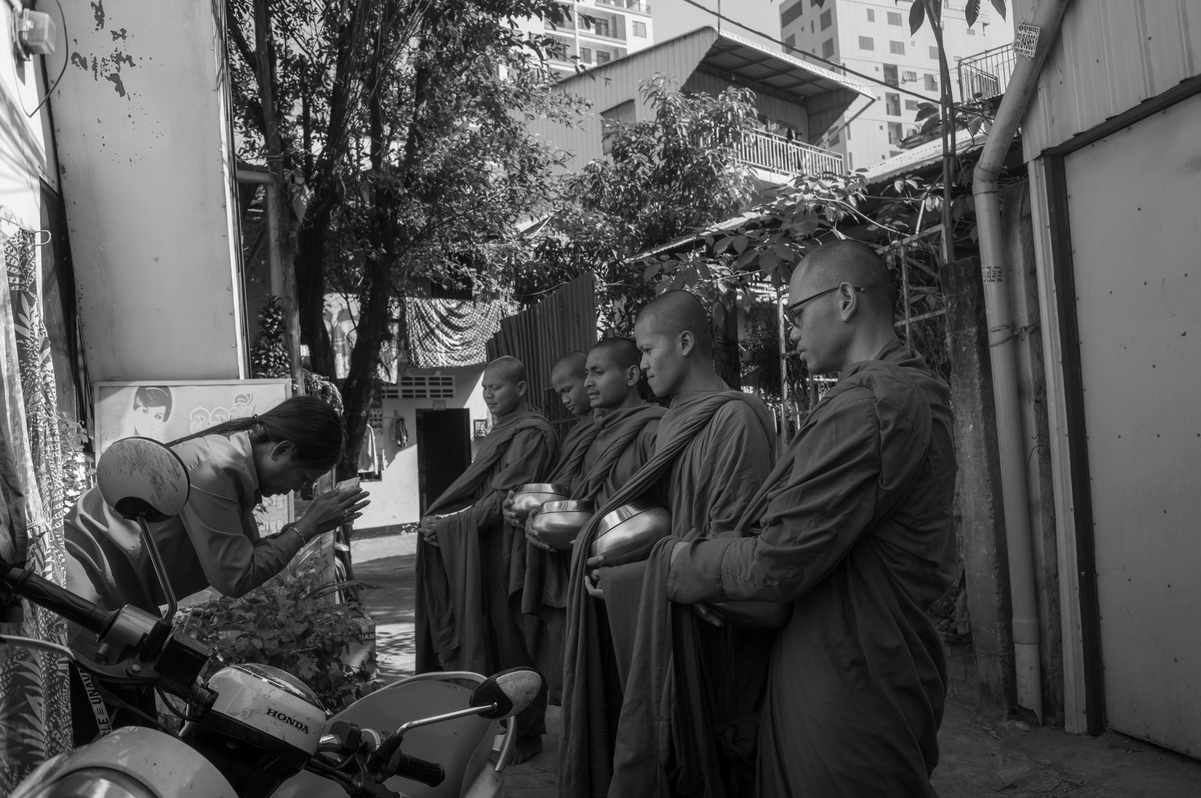 Monks visiting locals 02