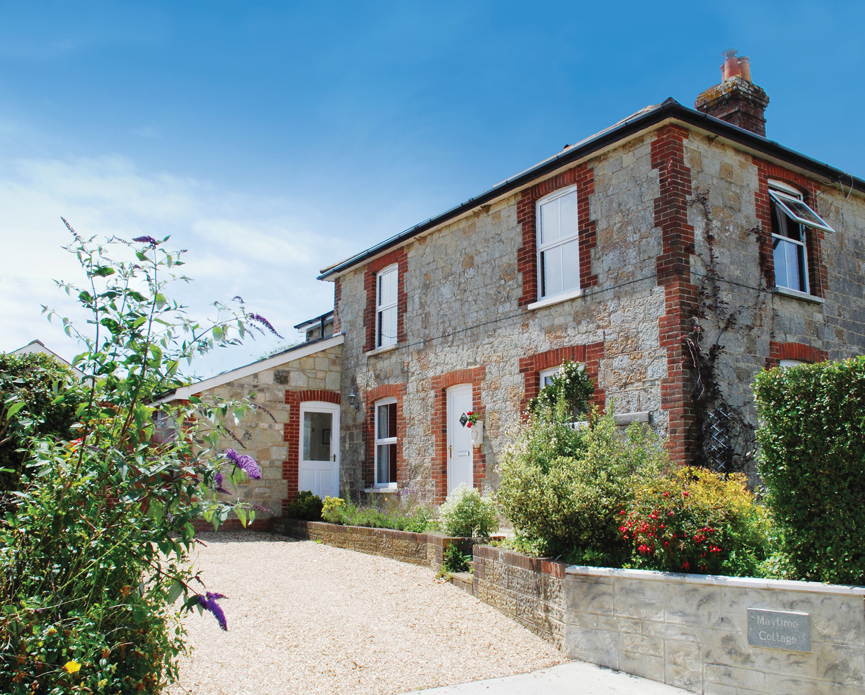 the front and side of the cottage