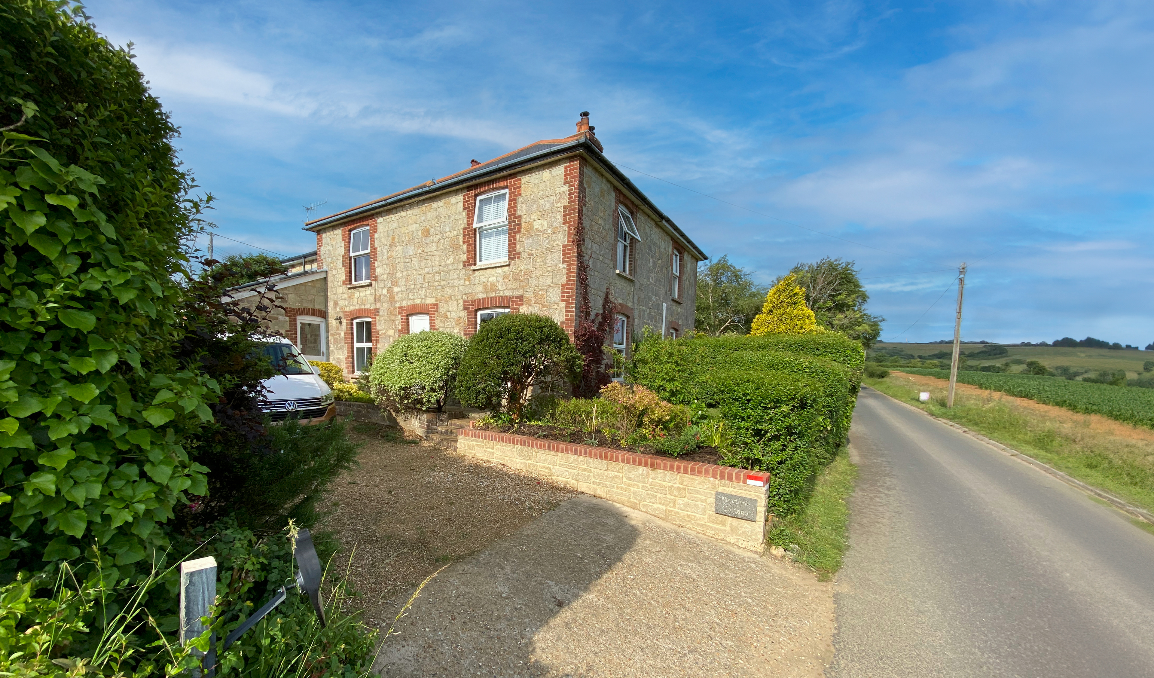 Maytime Cottage from the lane. Driveway parking for 2 cars