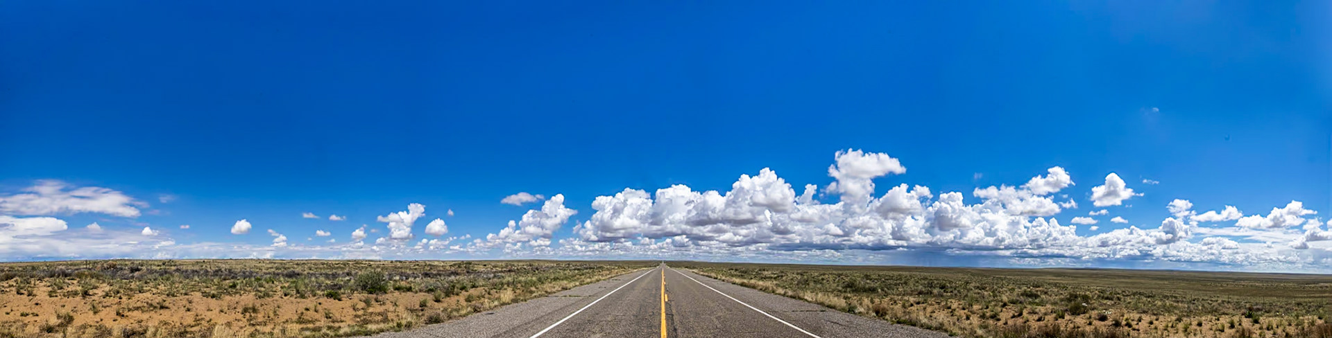 Highway 371 crossing prairie near Bisti Badlands, San Juan Bassin, NM
