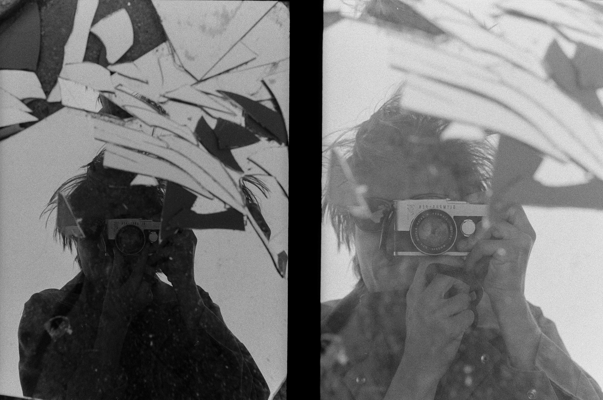 self portrait of Daniel zvereff in mirrors that are broken