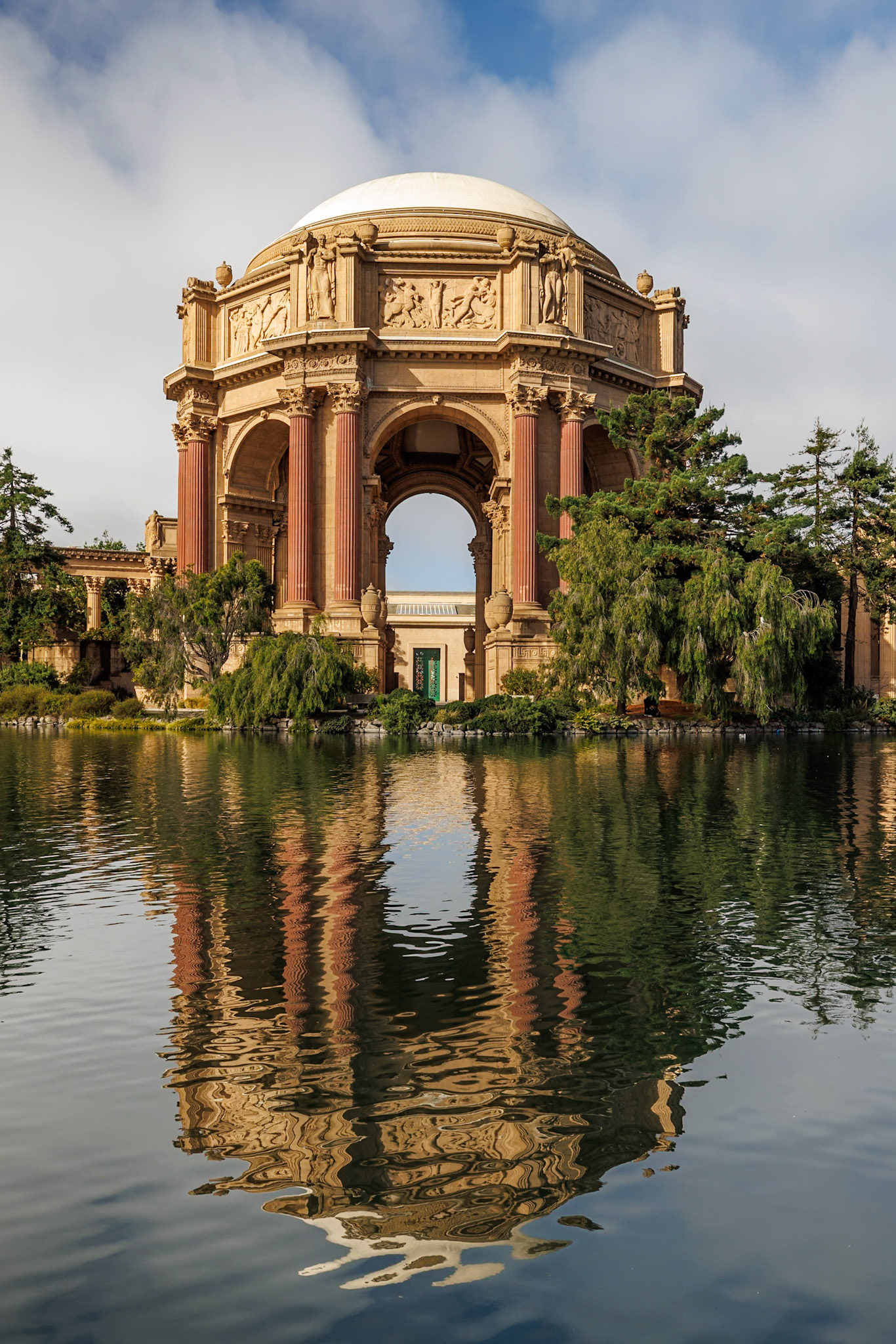 The Palace of Fine Arts in the Marina District of San Francisco, California, is a monumental structure originally constructed for the 1915 Panama-Pacific Exposition in order to exhibit works of art presented there. One of only a few surviving structures from the Exposition, it is still situated on its original site. It was rebuilt in 1965, and renovation of the lagoon, walkways, and a seismic retrofit were completed in early 2009.