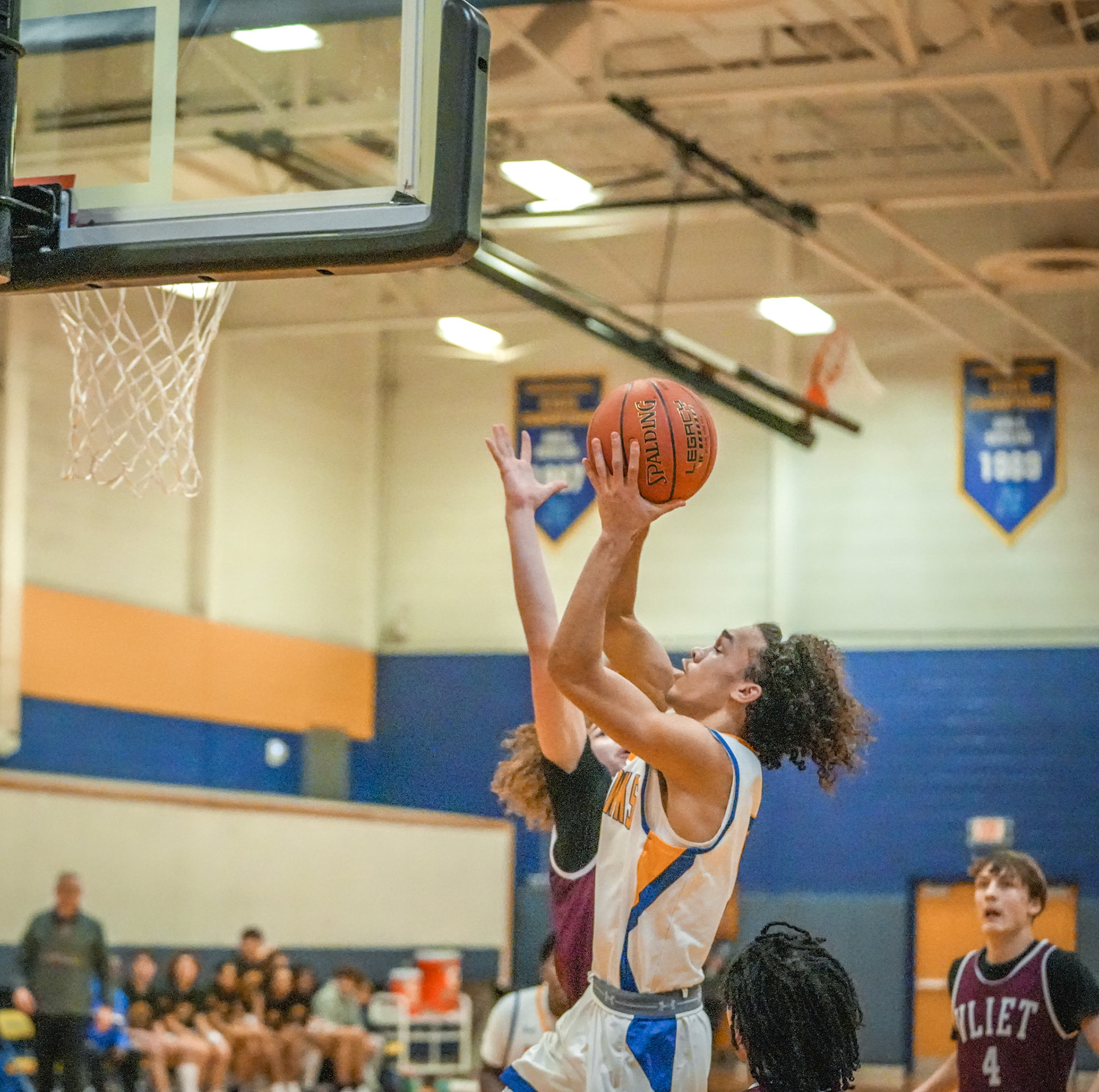 Keith Robinson strong to the hoop.