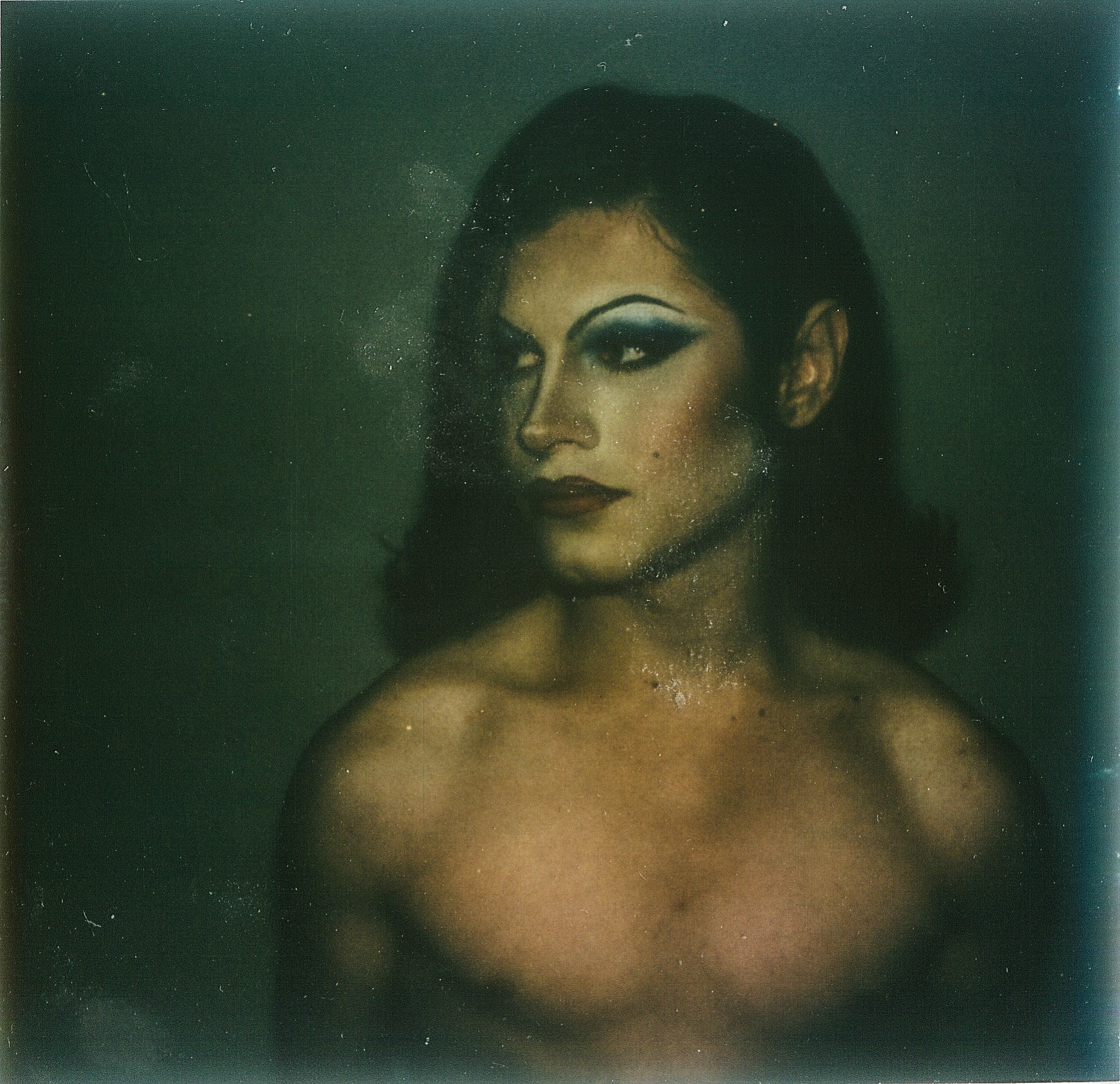 'TURN AND FACE THE STRANGE' POLAROID