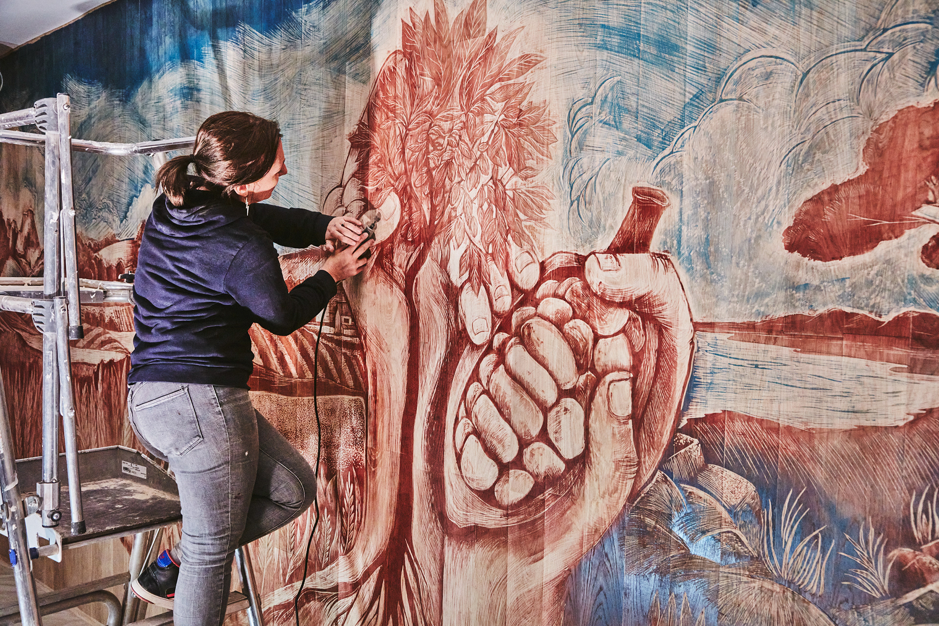 Création d'une fresque gravée sur bois pour la boutique de Gare de Lyon