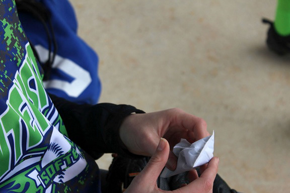 Many players on Saturday, April 14, 2018 can be found with handwarmers this cold day at Hidden Valley Softball Complex in Blue Springs, Mo. The entire crowd at the complex grumbled about the unseasonably miserable day.