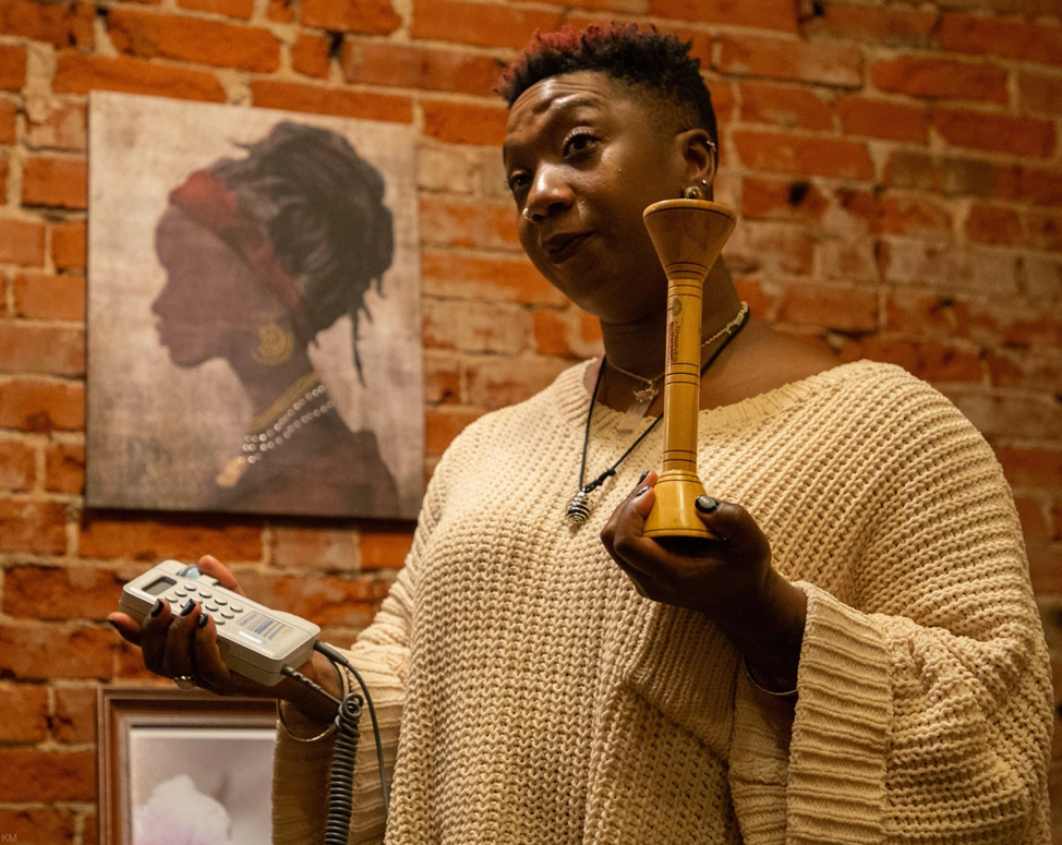 Kellman holds a fetal doppler (left) and pinard horn (right), both of which are used to listen to a fetal heartbeat, in Ferguson, Mo., Monday, Nov. 4, 2019. “As community midwives, we’re typically holistic, so we only work with low risk findings, meaning, you're healthy, you don't have any issues and so we try to keep people healthy,” she said. “So the more and more I centered my life on holistic wellness, the more and more my passion came out.”
