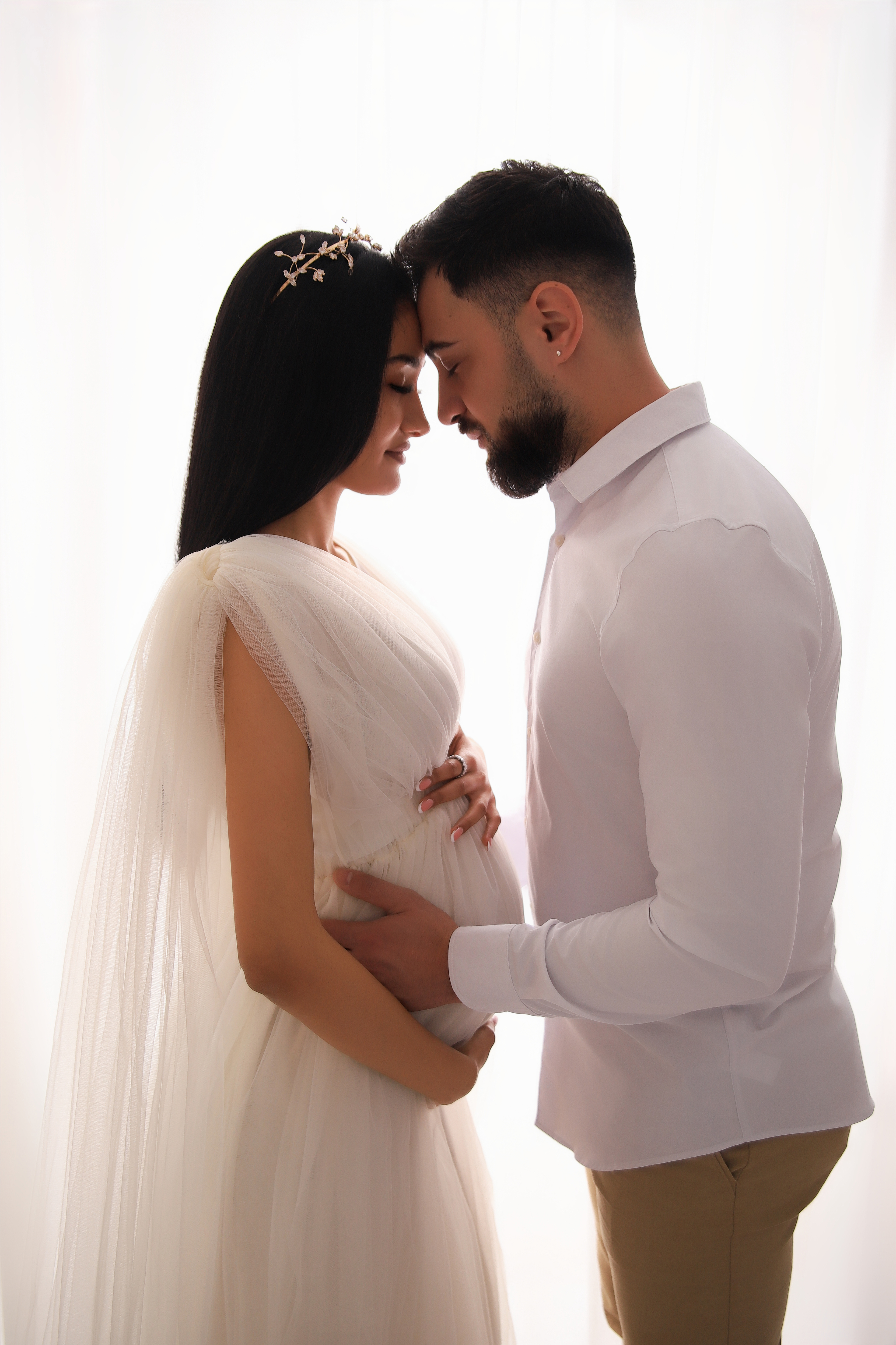 Kreativen Schangerschaftsbild mit Silhouette - Babybauchshooting