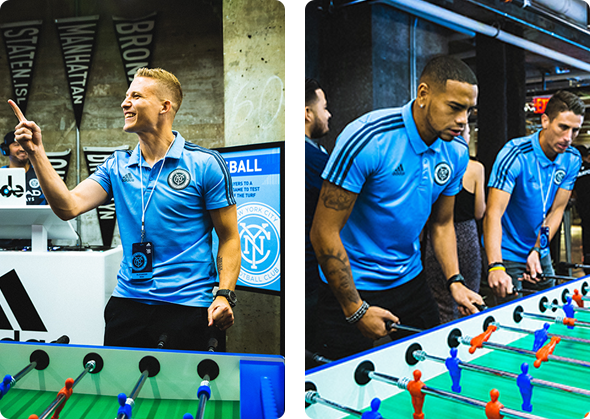 NYC FC players interacting with the XXL foosball table