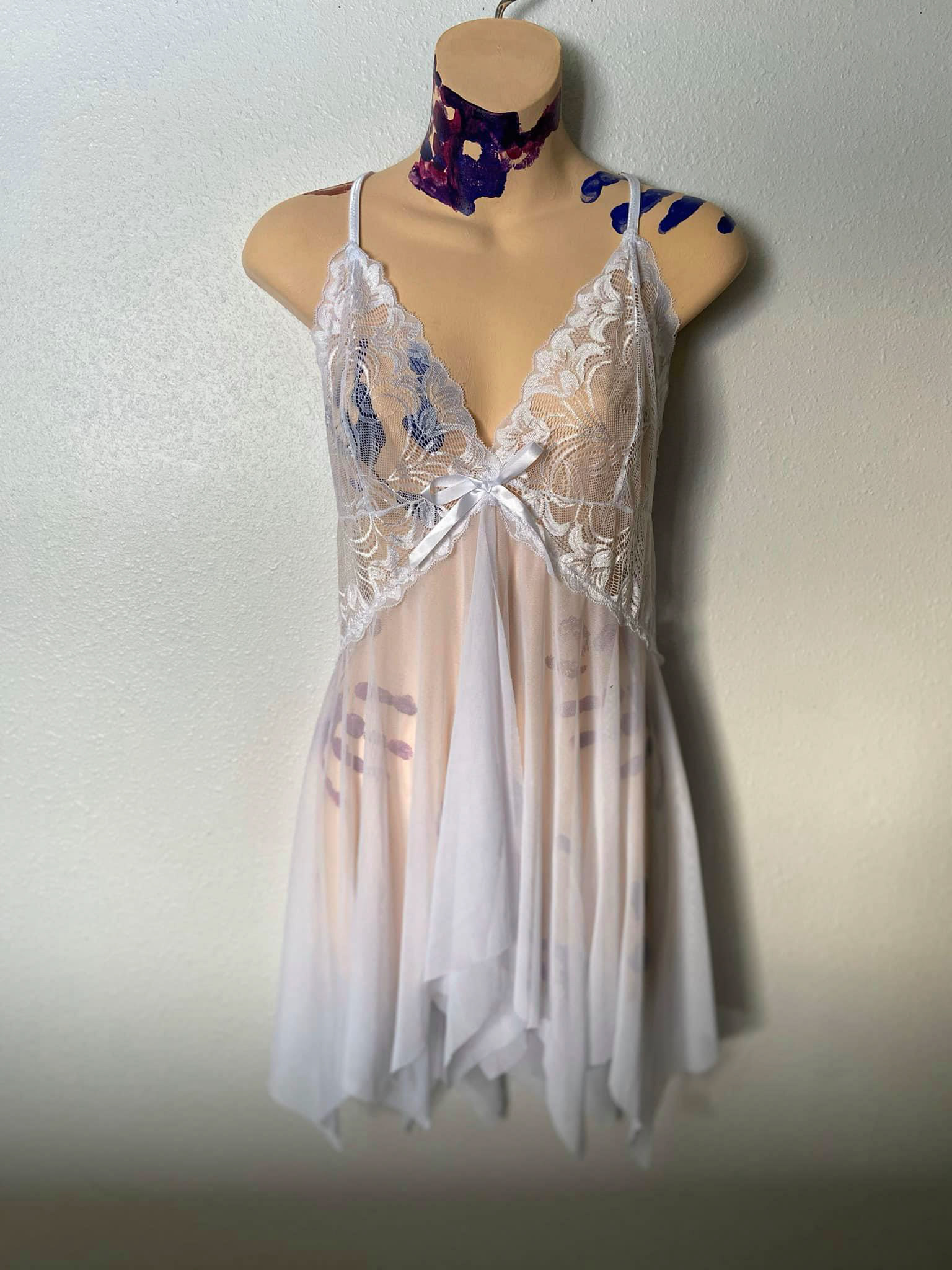Echoes (3) (2019) • Recycled mannequin, acrylic paint, and fabric • 32x 15.5"