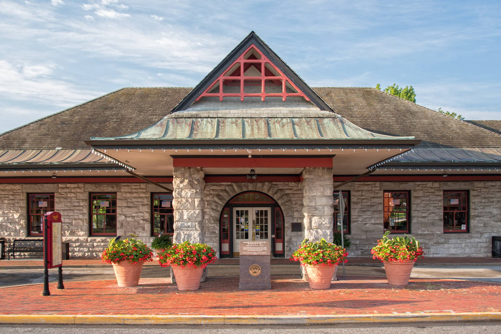 The Kirkwood Train Station is an example of Richardsonian architecture and was constructed by Douglass Donovan to replace a previous wooden station. The track for the Pacific Railroad to Kirkwood was completed in 1853. The first train arrived May 11, 1853, for an auction sale of lots, making Kirkwood the first planned suburb west of the Mississippi. The town was named for the chief engineer for the railroad, James P. Kirkwood. Commuter trains ran to and through Kirkwood until 1961. It is still an active station for Amtrak service and also serves as a visitors center.