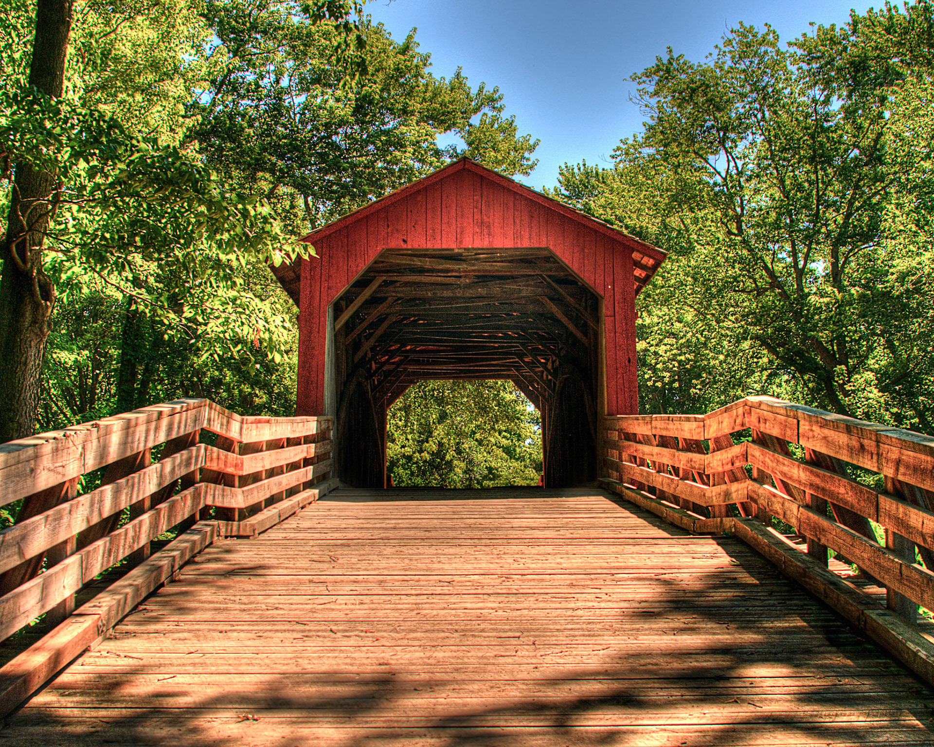 The Covered Bridge on Sugar Creek, also known as the Glenarm or the Hedley Bridge, was originally constructed in 1880 using the Burr Arch design and was rehabilitated in 1969 by IDOT. The bridge can be found by exiting at Glenarm (exit 83) off of I-55, just west of Springfield, IL.