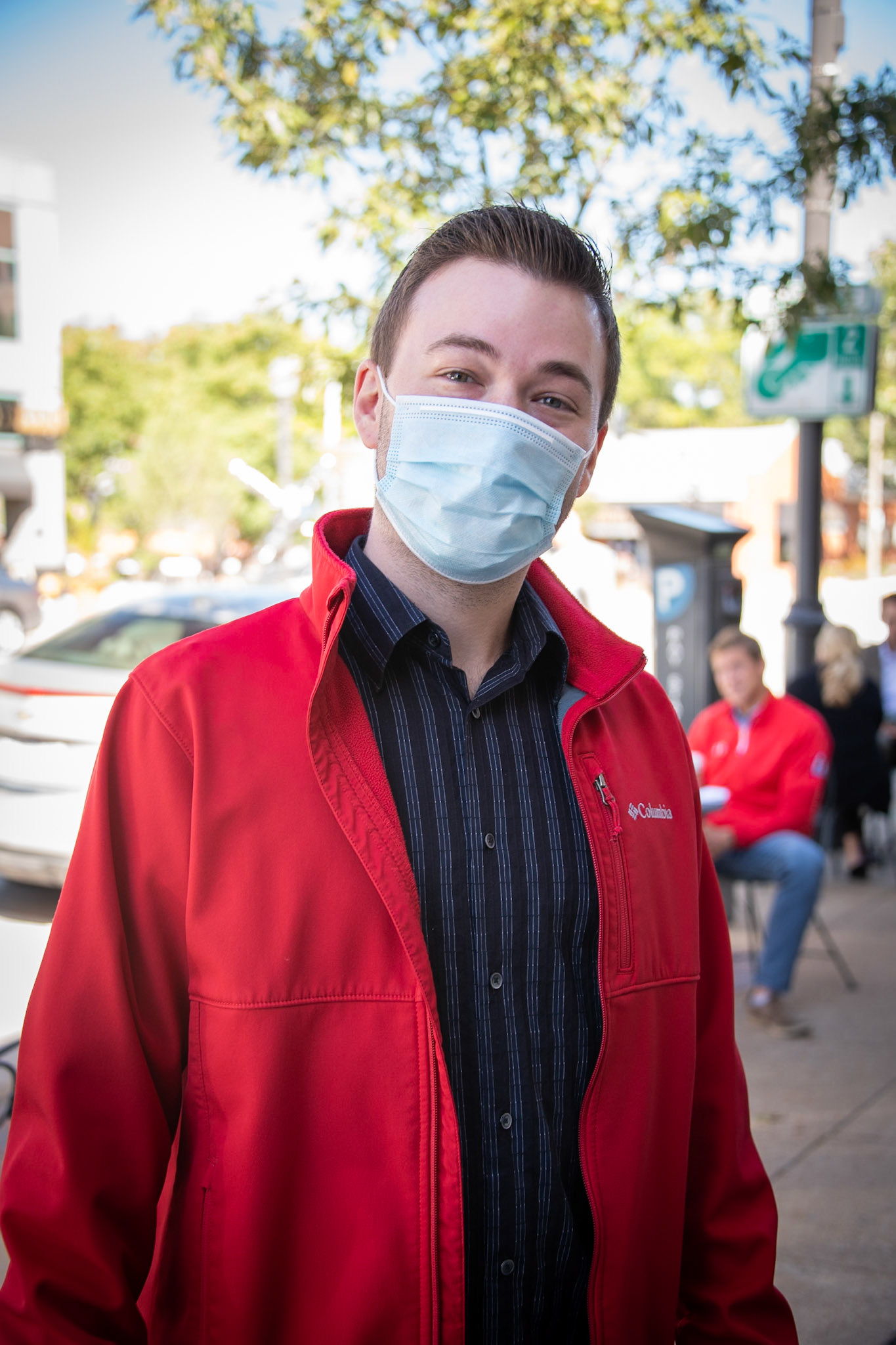 "How do you feel about wearing face masks?", I asked the gentleman seated at the table. "I'm good with wearing them", he replied. "We need to do this if we're going to get through Covid.""Have you found that you've formed any new habits as a result?" He nodded yes. "I'm definitely more intentional when I leave the house these days. I make sure I always have a mask and hand sanitizer with me... oh, and snacks. I don't eat out anymore."His friend and co-worker (in the red) walked by as we were chatting. I noticed that they did a quick elbow bump. The friend joined in on the conversation and agreed, "I'm good with wearing masks". We need to do this to stay safe."