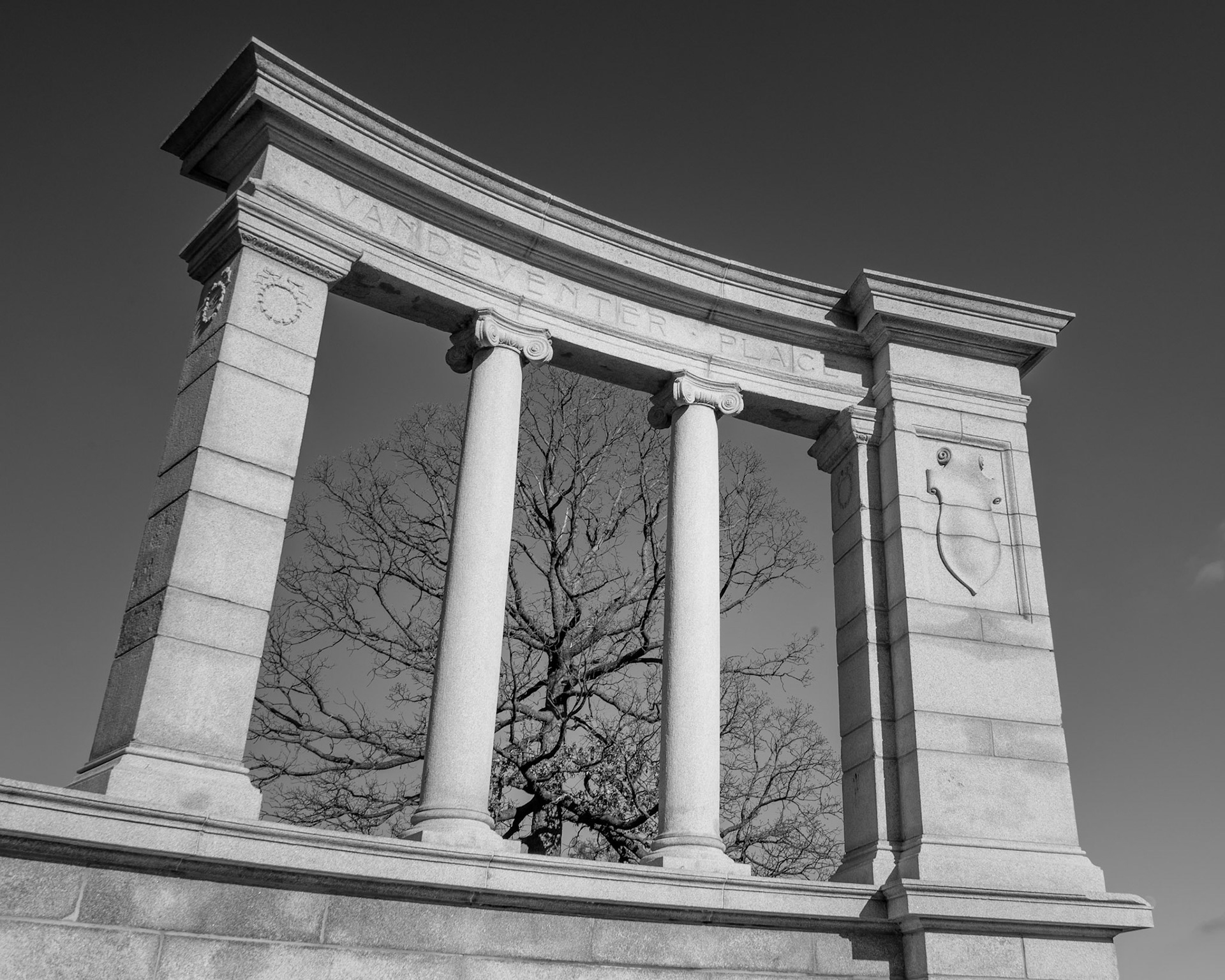Vandeventer GateThis granite-and-iron entrance gate was installed in Forest Park (near the Jewel Box) in 1950–51. The gate once guarded the east entrance to Vandeventer Place, the most exclusive address in St Louis in the late 19th century. By 1947, the area fell from favor and was razed. The Vandeventer Gate was relocated to Forest Park and is all that remains of a once distinguished neighborhood.
